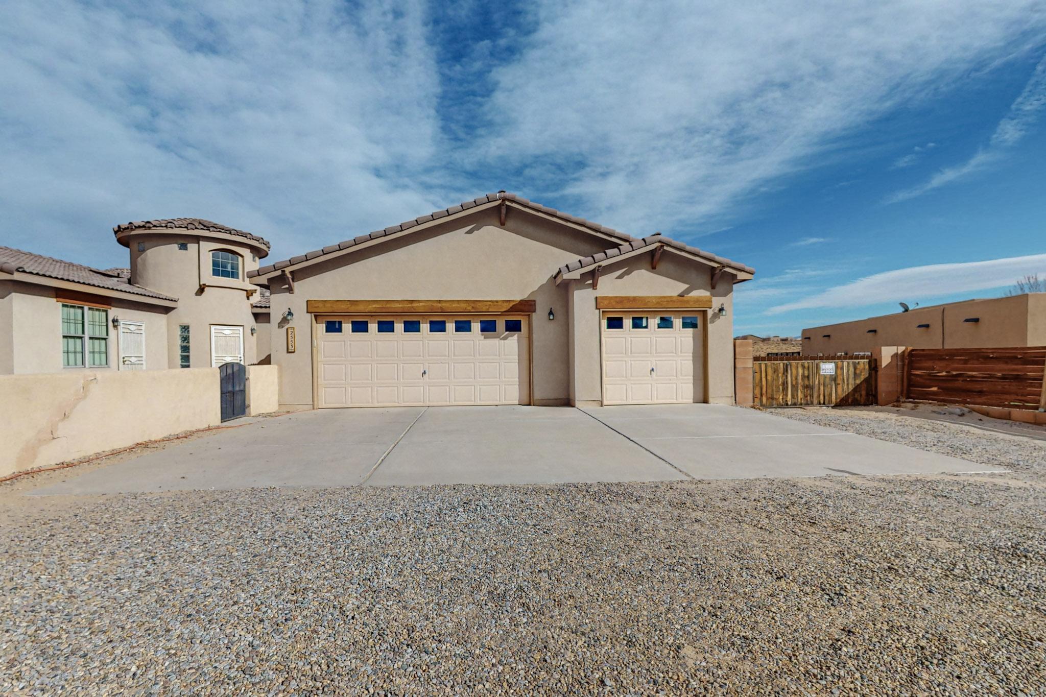 Welcome to this amazing 1 story home!  Lovely home with 3 bedrooms & an office in the main floor plan & wonderful guest/extended family home attached.  Kitchen features beautiful granite counter tops, lovely appliances, eat-in kitchen, plenty of cabinets & open to one of two living areas!  Additional room (19.75x14.5) at the back of the house to use as you please & opens to a large covered patio.  Big primary bedroom separate, very large bathroom & huge walk in closet!   All of this on a half acre lot! Three car attached garage is finished with additional attached storage room.  Detached shop is 30x30 finished, well insulated with 110/220 power, & another shed by the shop is 20s12!  Back yard access.  Property backs to an arroyo too, so no neighbors behind you!  This home has it all!