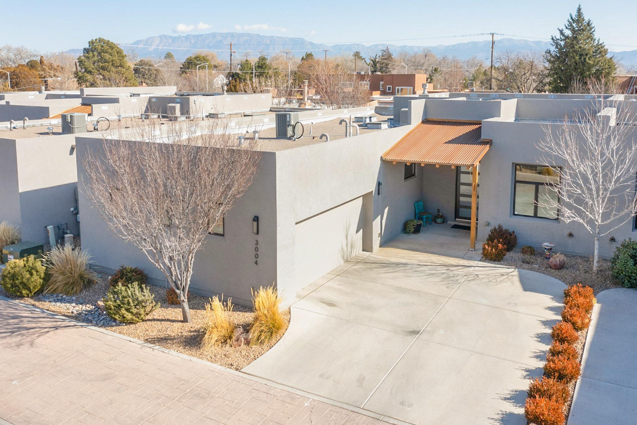 This contemporary 3-bedroom, 2-bathroom home, built in 2017 by Las Ventanas, offers the perfect blend of modern comfort and outdoor living. Located in the desirable North Valley, it's just steps away from the Nature Center with scenic hiking and biking trails. Enjoy the convenience of a brand-new co-op being built nearby for easy access to local goods and services. Featuring ENERGY STAR, Green Build Silver, This home is designed to keep you comfortable year-round while minimizing your environmental footprint. Perfect for those who appreciate nature, sustainability, and modern living all grouped into a floor plan design and neighborhood that is unmatched!