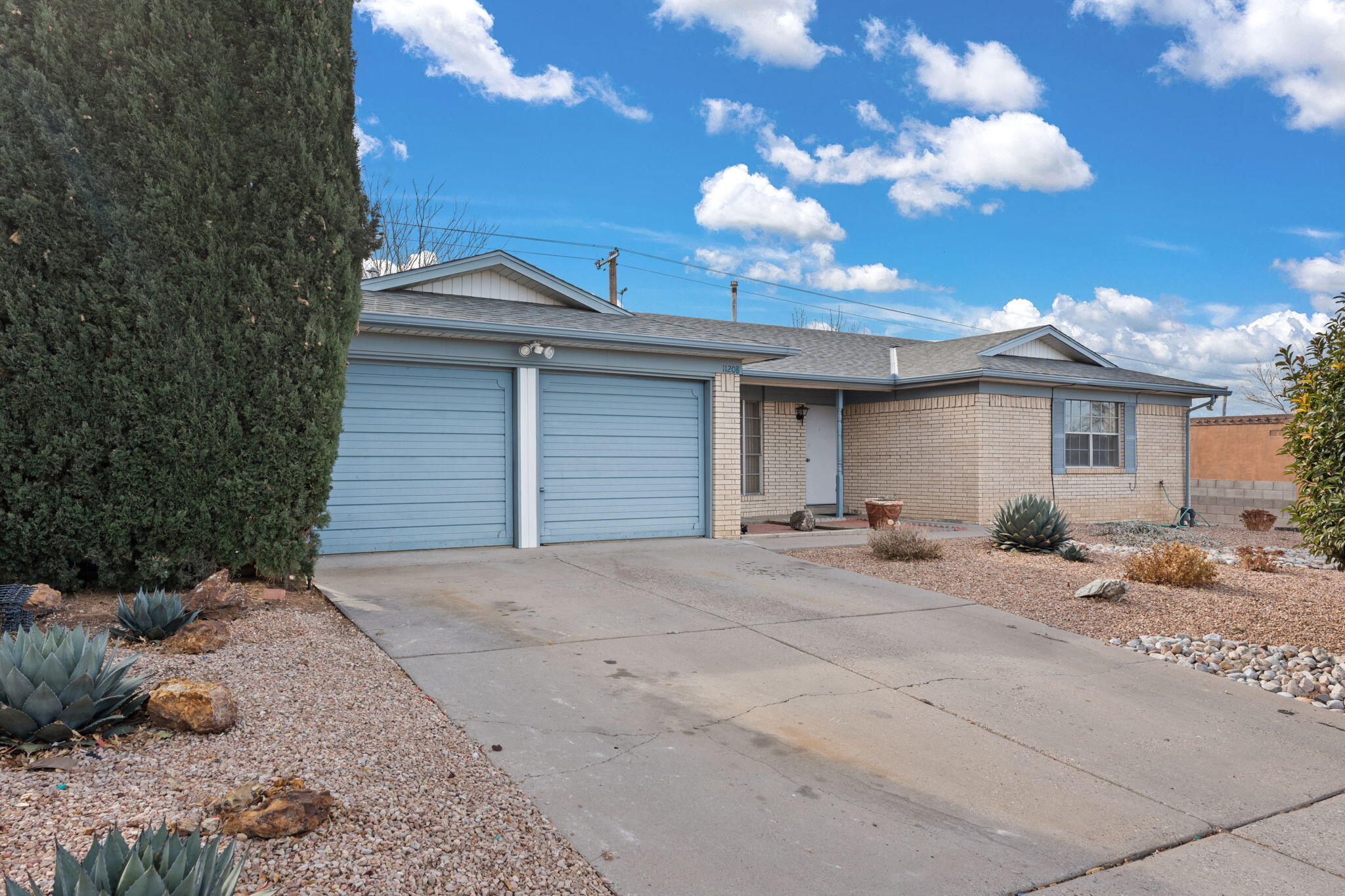 CHARMING HOME W/ STUNNING SANDIA VIEWSWelcome to 11208 Baja Dr! This charming home offers a cozy wood-burning fireplace, two living areas, and a large kitchen perfect for entertaining. The laundry room adds convenience, while the spacious backyard provides plenty of room to relax or play. Enjoy stunning Sandia Mountain views from the front yard. Located in the NE Heights, this home is close to Flying Star Cafe, Sprouts Farmers Market, and a variety of restaurants and amenities. With its prime location and functional layout, this property is a must-see.Schedule your showing today!