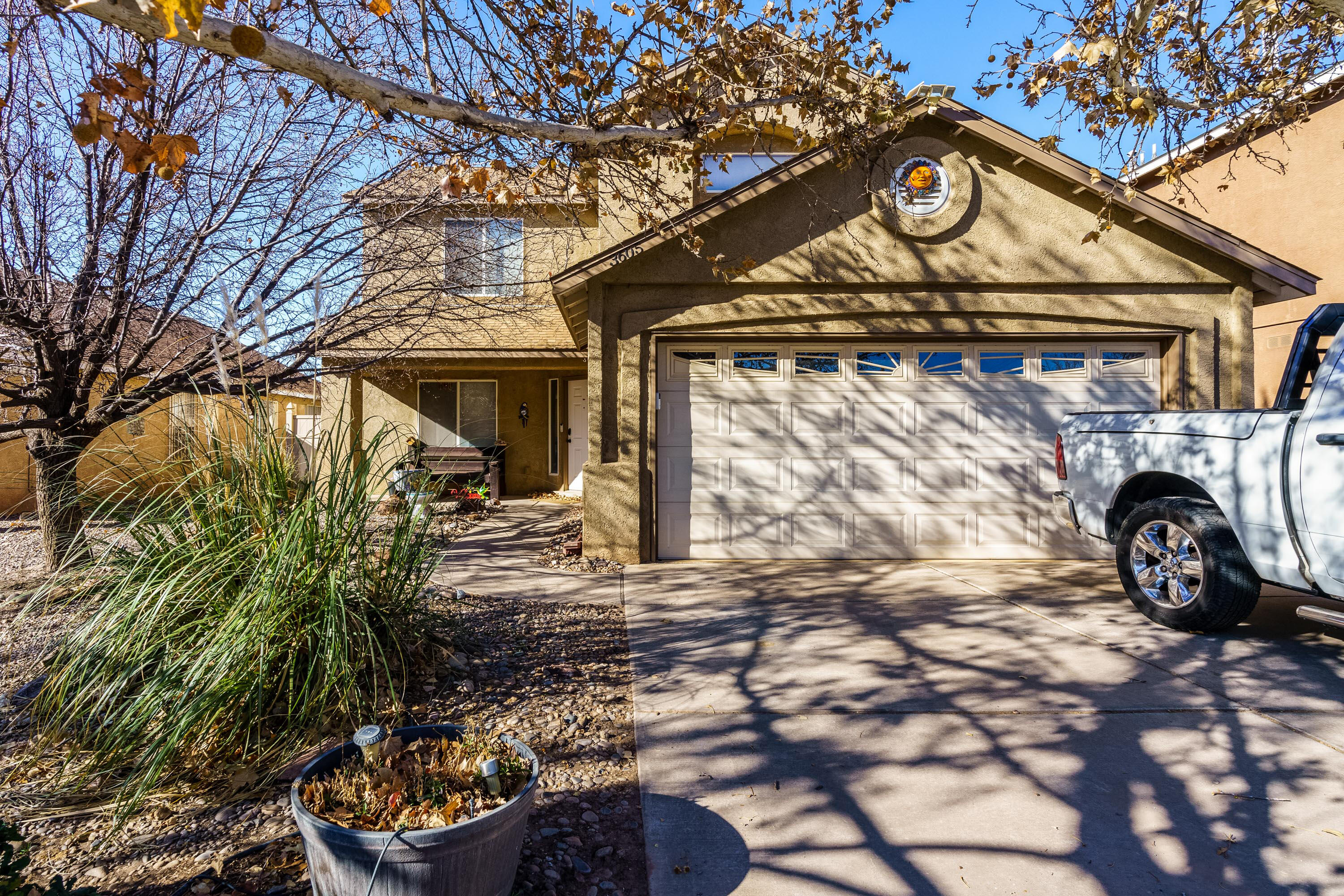 This beautiful 3 bedroom, 2.5 bath home is situated in the Rio Bravo Commons.  Enjoy the living rooms gas fireplace on cozy winter nights.  The kitchen features  stainless-steel appliances, granite countertops, breakfast nook, bar and  pantry.  French doors off the kitchen/family room give you access to a large covered patio for entertaining. The open staircase leads to 3 bedrooms and a loft upstairs.  The primary en suite offers a luxurious stand-alone tub, shower, double sinks & walk-in closet.  The loft gives you extra living space for the kids or a quiet getaway.  From the backyard you have access to the neighborhood park.  Great location close to the Railrunner, Bosque trails and shopping.