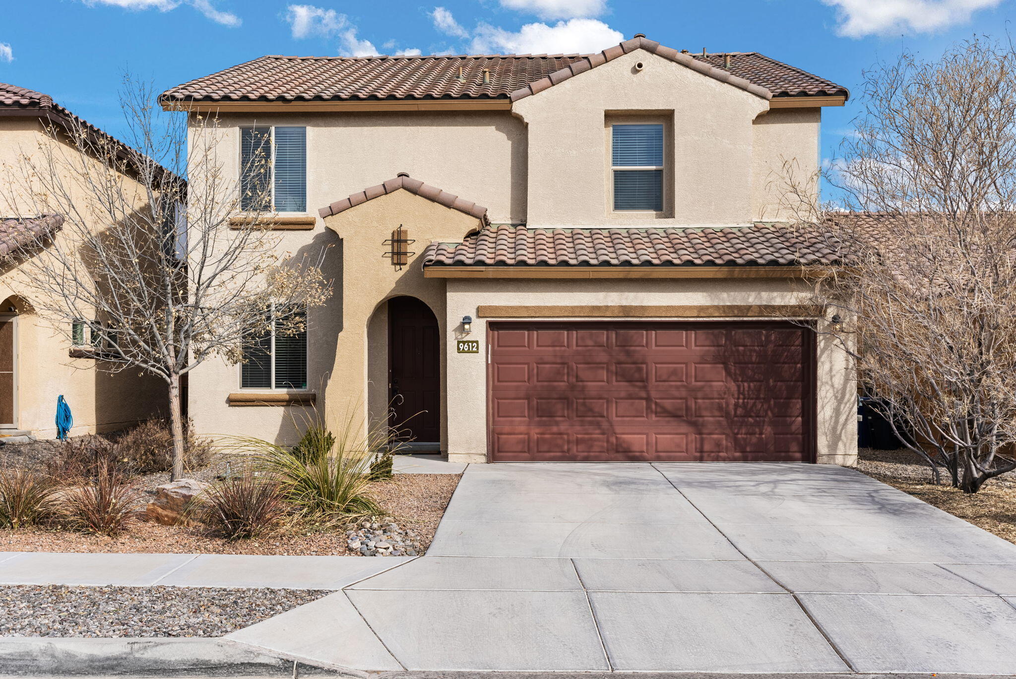 Located in the exclusive westside community, The Boulders, this 1-Owner Pulte Home is a must see! This breathtaking two-story offers an open floor plan designed for both comfort and versatility. You'll enjoy the flexibility of a bedroom, full bath, and a bonus space ready to become an office, media room, or even a 5th bedroom. The heart of the home--a chef's kitchen--boasts a sprawling island, granite countertops,  and pantry conveniently located across from living room. Upstairs, you'll find a serene primary suite, two additional bedrooms, and a warm family room perfect for gathering, watching tv or reading a best seller...Fully landscaped with a covered back porch, grass, trees and lots of greenery! 2 car garage with epoxied floors! Your perfect life starts here--schedule a showing today!