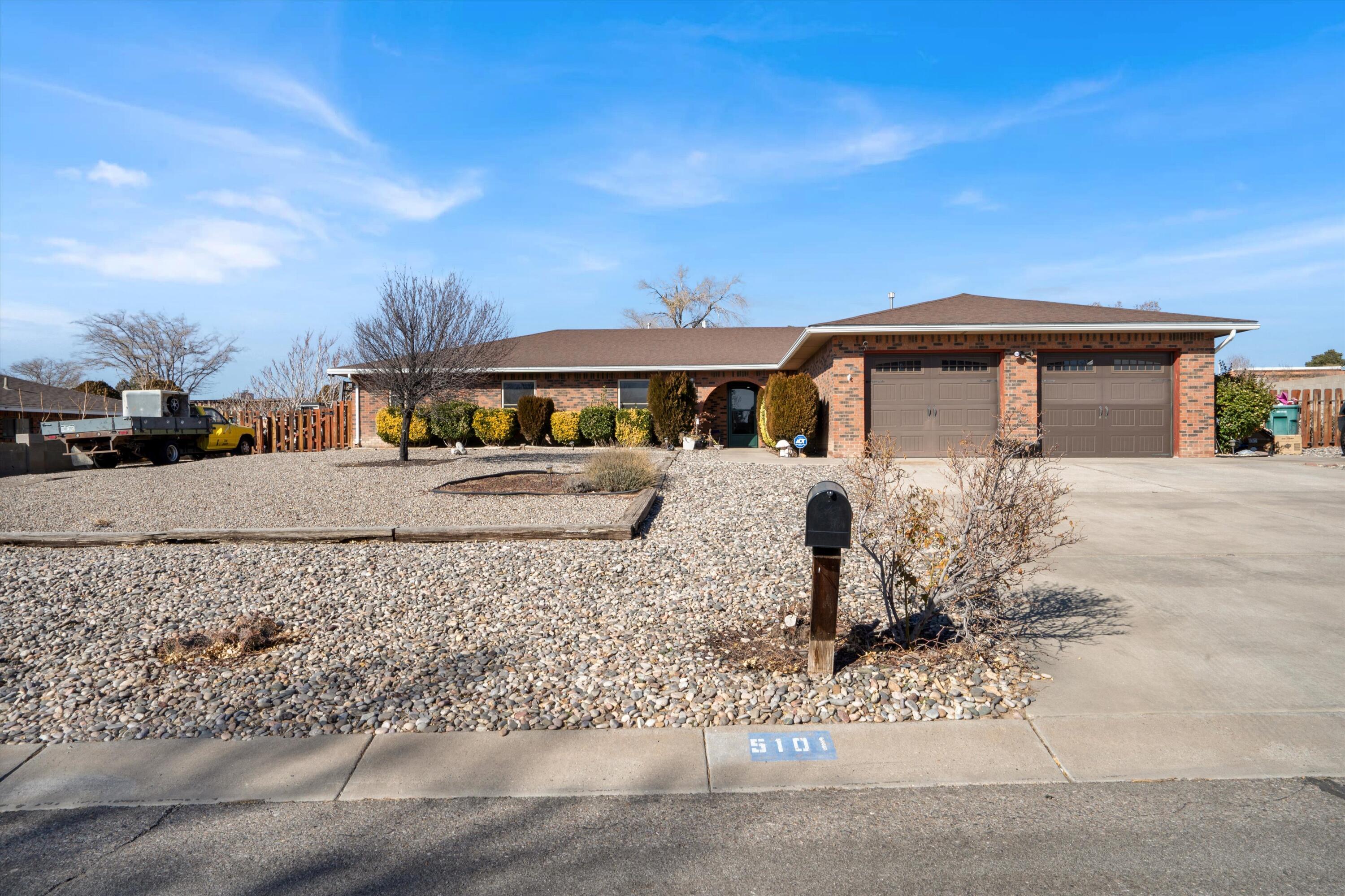 Welcome home to this spacious 4-bedroom home boasting an open-concept living, dining, and kitchen area with a stunning floor-to-ceiling brick gas fireplace. Relax in the bonus sunroom (with A/C). The huge .4 acre lot is sure to impress with backyard access, shed with electric and extra loft storage, gazebo and plenty of space for your RV and toys! Oversized 2-car garage. Located in the sought after Paradise Hills Golf Club area with easy access to Shopping, Trails, Golfing, Food, Schools, Bicycling and much more!