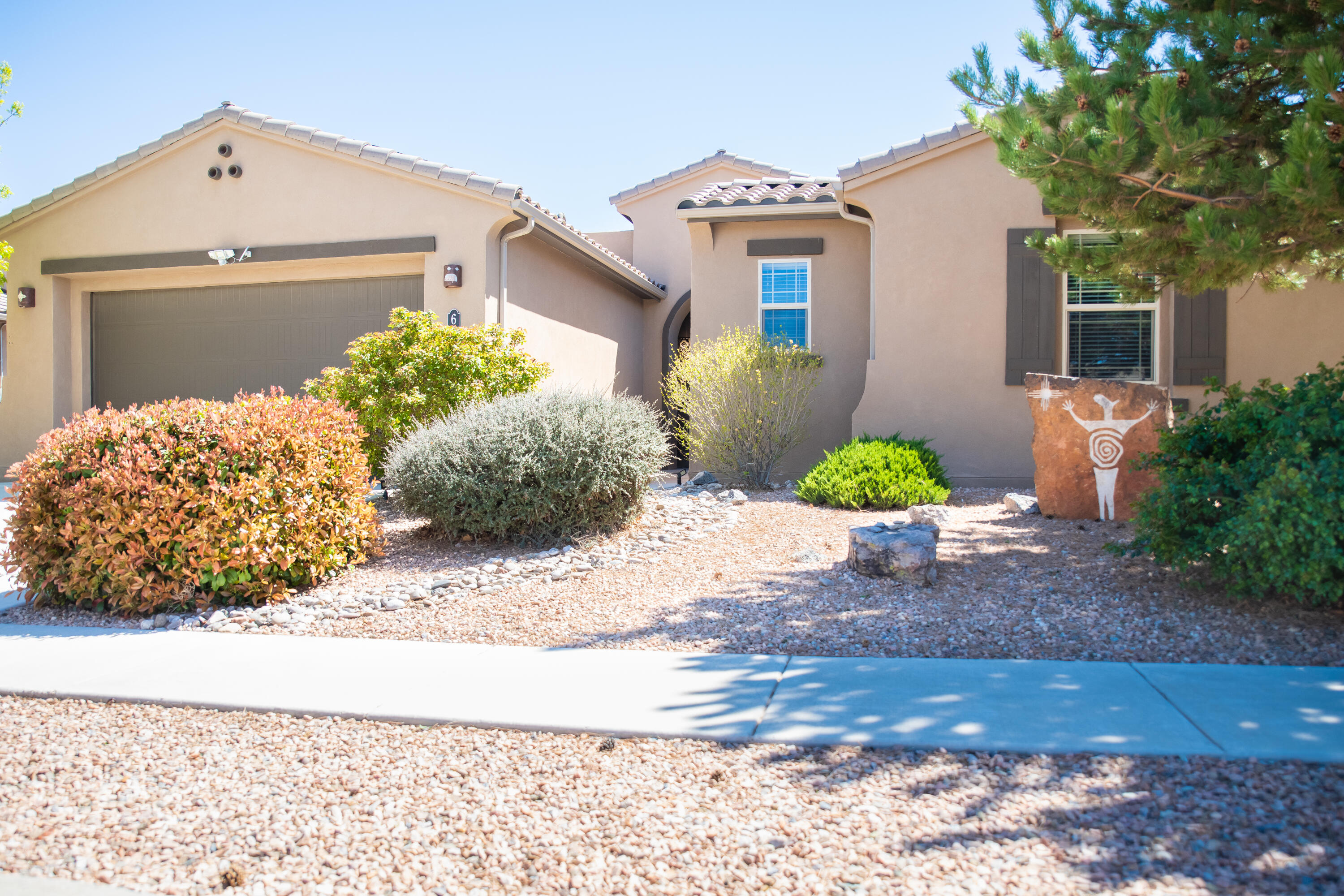 Clean, like new home in desirable neighborhood! This lovely home offers 3 roomy bedrooms, 3 bathrooms, and a light and bright open floor plan. Upgraded kitchen, stainless steel appliances, upgraded cabinetry and granite counter tops, bathrooms also have many upgrades. Stacked stone fireplace, refrigerated air, tank less water heater, and leased solar panels. Great room opens to the low maintenance back yard with a pergola, located in the coveted La Cuentista Subdivision. The upgraded landscaping is already in place, Don't wait for new construction, this one is move in ready.