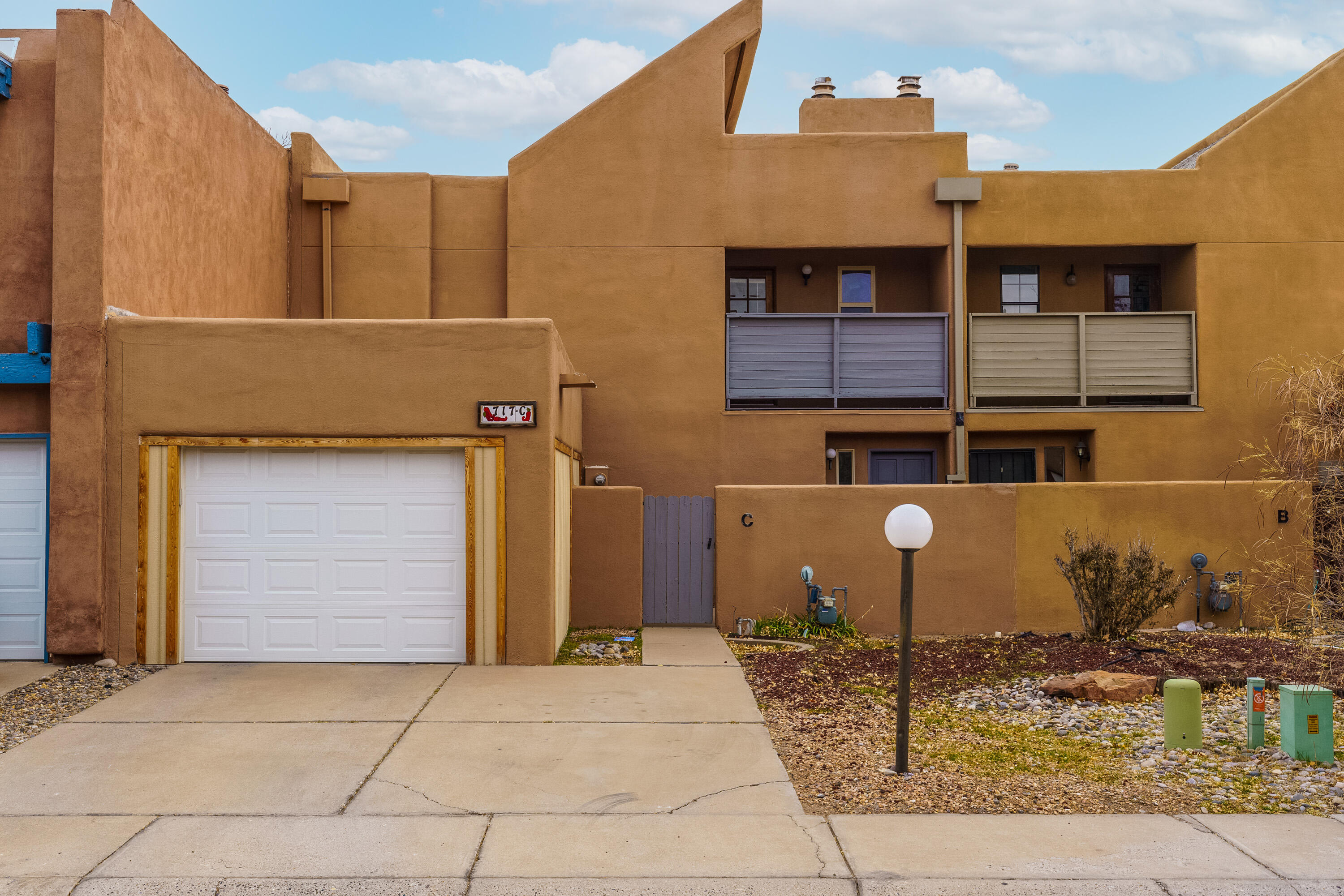 Come take a look at this terrific townhome located in the heart of Albuquerque. This property is close to so many amenities and ready for you to make it a home. This move in ready property lets in tons of natural light which makes it welcoming to anyone who enters. The property has so many improvements including levelor blinds throughout, a beautiful butcher block countertop, glass tile backsplash, and complete with only a 2 year old kitchen appliance package. On the outside their is a fully enclosed garage and the backyard has been fully landscaped and is ready for you to enjoy. Come take a look!