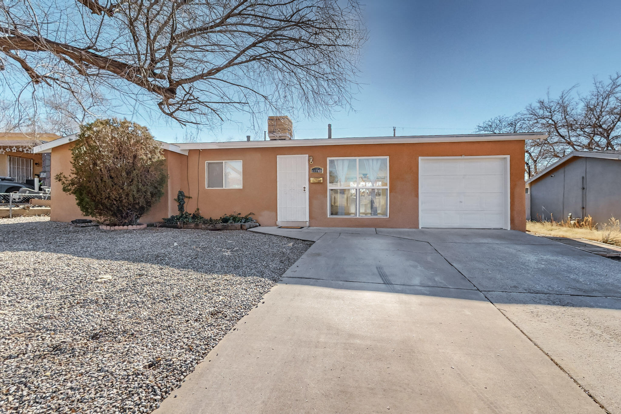 This charming 3-bedroom home in Northeast Heights offers a functional and spacious floor plan. With fresh paint and new carpet throughout! The home features newer windows that allow plenty of natural light and includes two wall units and a newer evaporative cooling unit. The kitchen includes a cooktop with a range hood, providing a practical setup for cooking. Private fenced backyard. No HOA or PID. Come see this move-in ready property. Schedule a showing today!