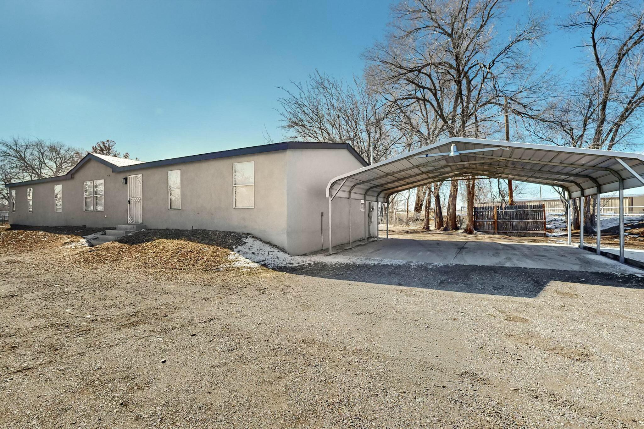 Welcome to this beautifully renovated home in the highly sought-after Bosque Farms community. The home has 4 generous bedrooms, including a versatile office space that could easily serve as a fifth bedroom. Every inch of this home has been thoughtfully updated, from the brand-new roof and water heater to the modern, energy-efficient AC system. Step outside to find a large backyard with a huge storage room. This home is close to all the amenities you need, while still offering the tranquility and beauty of rural living.