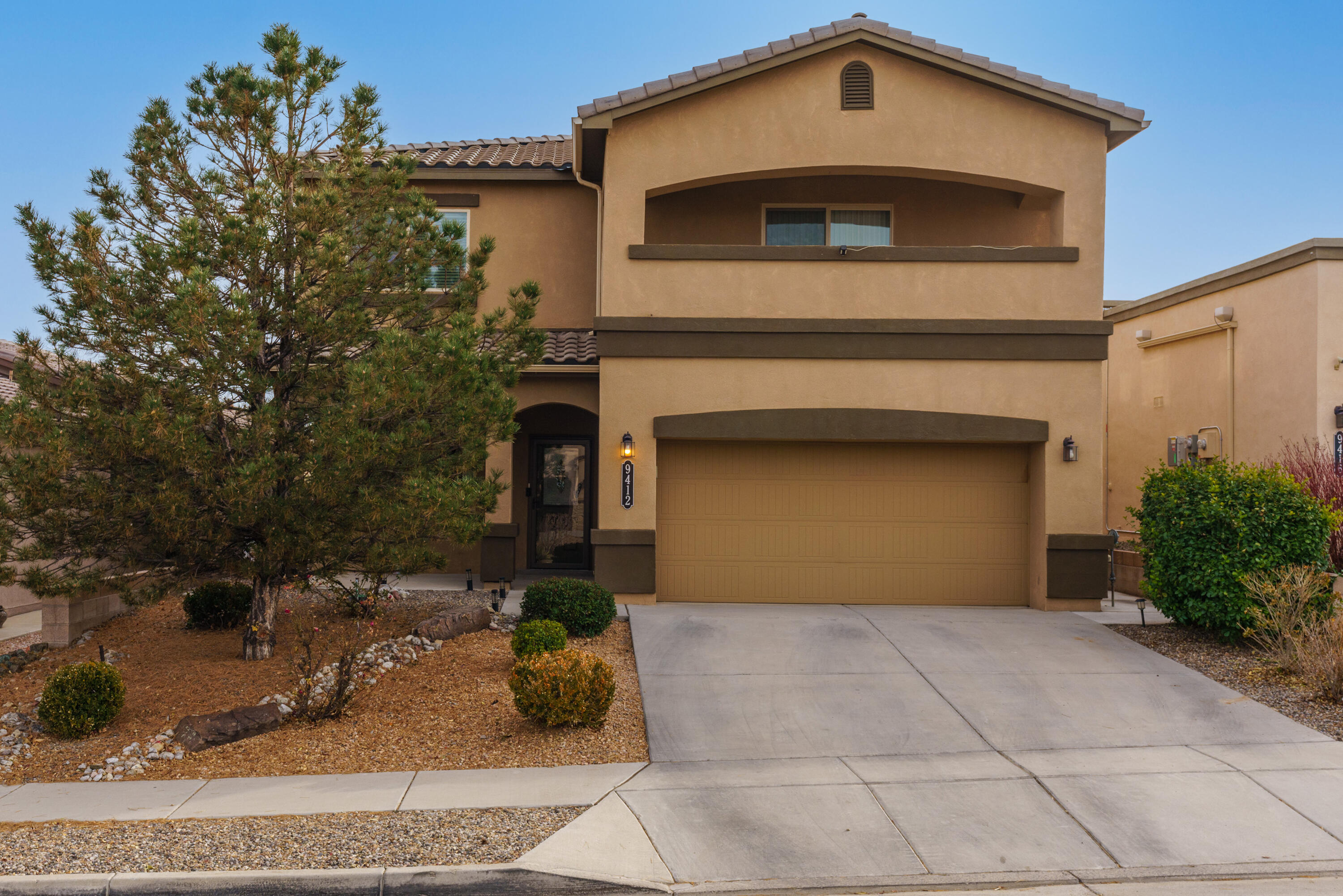 Welcome to this wonderful 4-bedroom home in the Stormcloud subdivision, offering a versatile layout by DR Horton. The main level features tile floors, two living areas, and a cozy coffee bar nook in the den. The large kitchen has dark granite,  SS appliances, ample counter space, and a convenient sit-at bar, making it ideal for entertaining. All bedrooms are upstairs including a large loft perfect for a second living space or home office as well, carpet has been replaced with newer LVT flooring. The primary suite includes a private balcony, walk-in closet and tons of space. Step outside to a lush, fully landscaped backyard with green grass, and mature trees.  Enjoy refrigerated A/C, and Solar for lower electricity bills. Close to walking trails, parks, and more. Schedule a showing today!