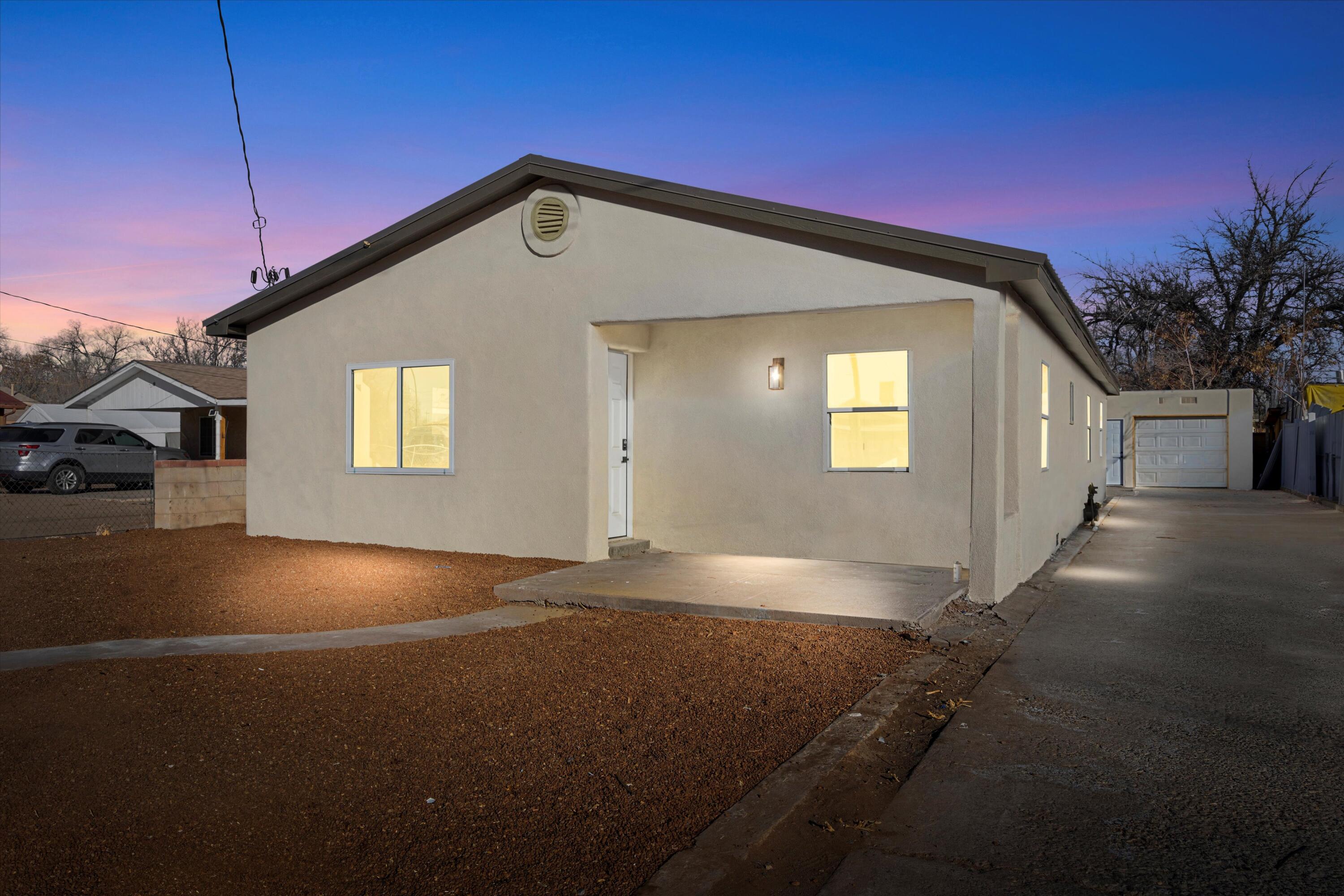 This phenomenal, renovated home in Albuquerque offers unbeatable charm and modern upgrades, all nestled on a quiet cul-de-sac. Featuring a durable pitched metal roof, new synthetic stucco, and thermal windows, providing both longevity and efficiency. Inside, the home boasts LED lighting, fresh neutral paint, new flooring and baseboards throughout. The brand-new kitchen is a unbeatable with beautiful quartz countertops and stainless steel appliances. Updated bathrooms, HVAC, electrical and a spacious utility room. You'll also love the spacious detached garage (TPO Roof) and so much more! Come see this, 10/10!!!