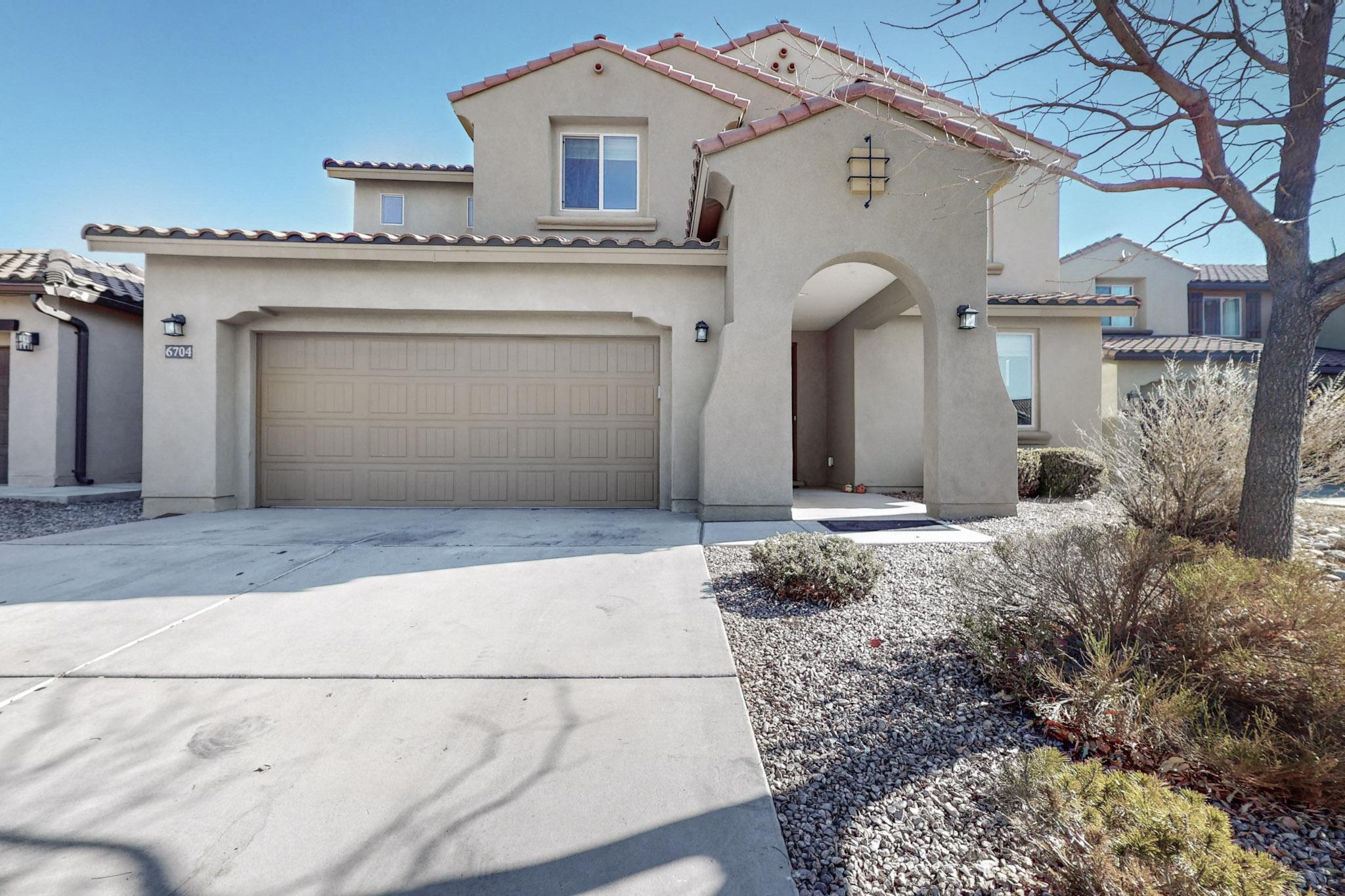 OWNER FINANCING OFFERED. This gorgeous and spacious home is sure to impress.   Enjoy amazing sunrises, views of the mountains and the sparkling city lights. Inside the home, you will find a large open chef's kitchen with island, granite countertops and stainless steel appliances. Upstairs you will find a game room/loft, a large laundry room, three spacious bedrooms, and a beautiful master suite. The master suite features a walk-in closet, a large shower and separate tub with double sinks, and best of all, a balcony to view the beautiful Sandia mountain range. There is a large tandem 3 car garage.  Beautifully landscaped backyard with plenty of room. Montecito West is a welcoming community with access to parks, trails, Boco Negro Canyon, and Paseo de la Mesa. Schedule your showing now!