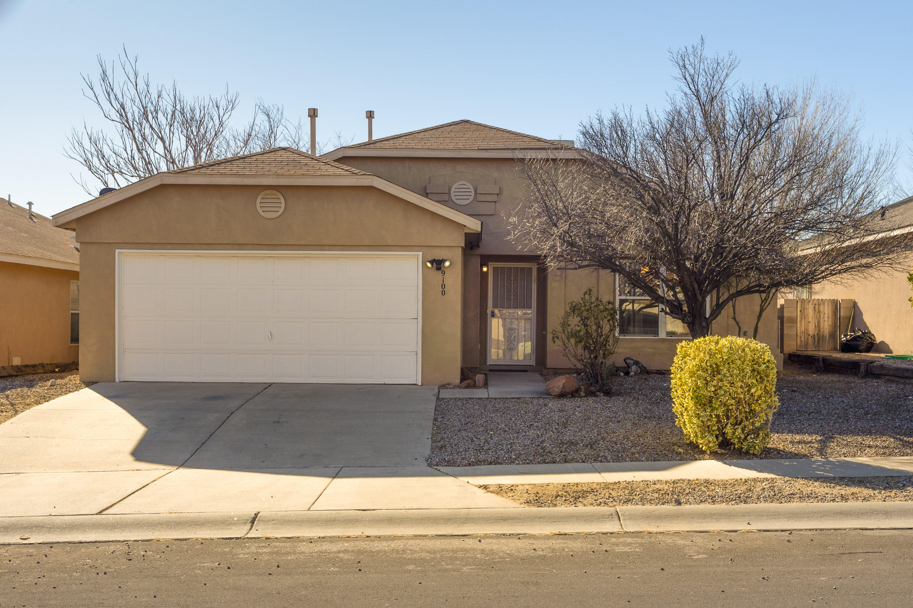 Charming single level gem located on a large lot! You will love this 3-bedroom, 2-bath home with fresh paint and NEW carpet (2025). The spacious & open floor plan is enhanced with raised ceilings. The great room is a perfect space for relaxing or entertaining, which flows into the generous size kitchen with laminate floor, stainless steel appliances & a sliding door opening to the patio and expansive backyard!  New water heater & swamp cooler 2022.! Conveniently located with easy access to I-40, dining, shopping, and schools! Don't miss seeing this home today!