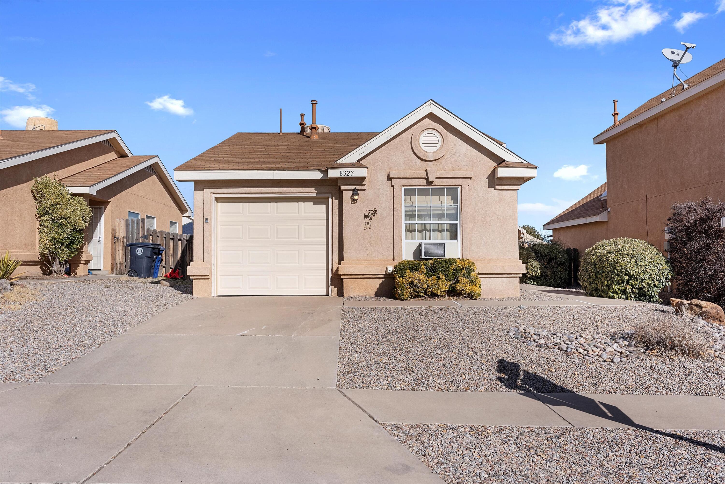 1 STORY COZY BEAUTY IN NW ALBUQUERQUE! Sunlight dances through the windows, filling the open floor plan with a golden glow. This well-kept, move-in-ready gem offers three cozy bedrooms and two full bathrooms, blending comfort and charm effortlessly. The compact yet functional kitchen, featuring a bar and pantry, makes every meal a delight. Plush carpet meets sleek wood flooring for the perfect balance of style and warmth. Outside, a large fenced backyard with a small patio invites you to unwind under the stars. Just blocks from Parkway Park and Painted Sky Elementary, with no HOA to hold you back. Don't wait--come see it today!