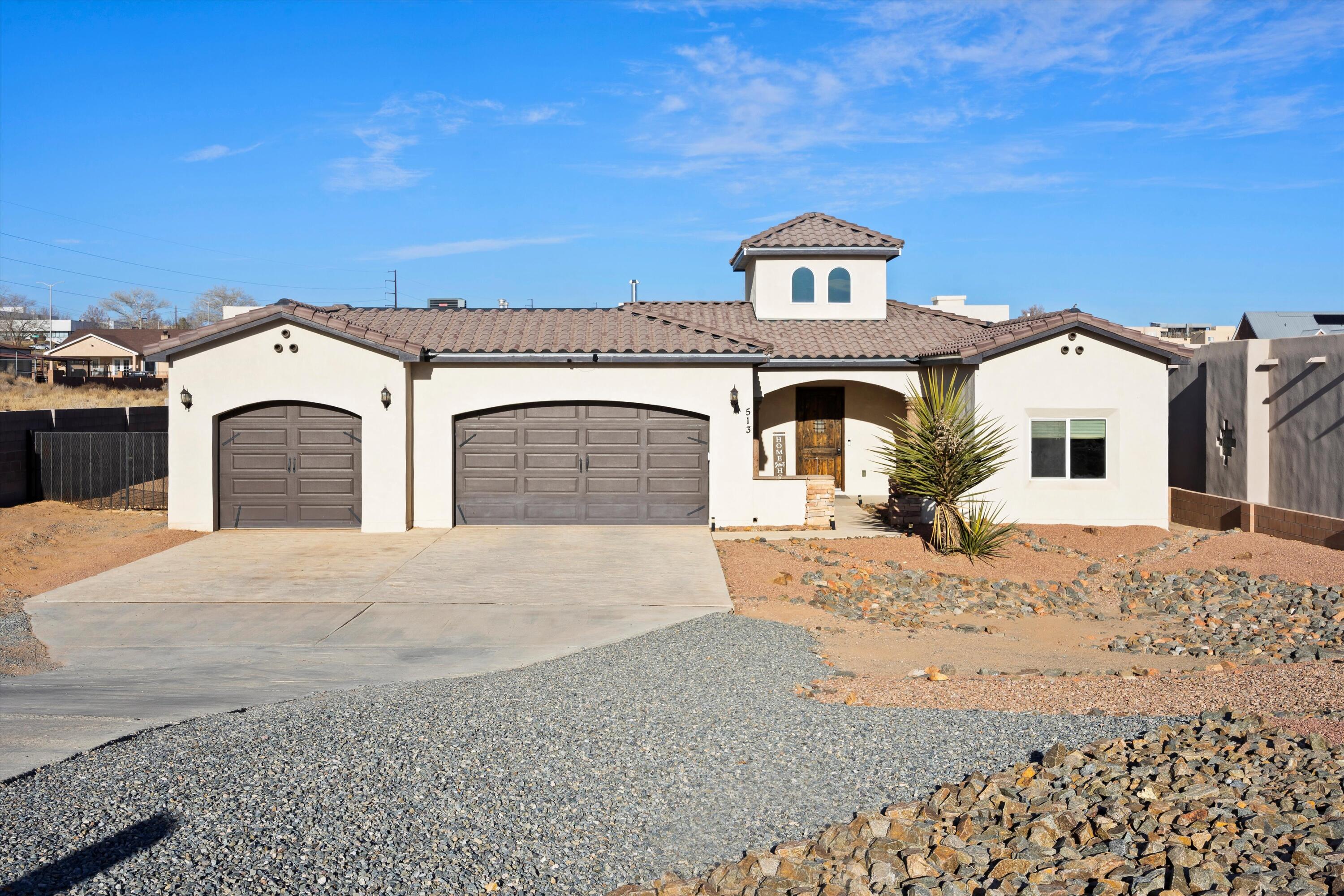 WAKE UP TO BREATHTAKING VIEWS EVERY DAY! In the heart of Rio Rancho, this custom-built home sits on a sprawling half-acre lot with no HOA to limit your lifestyle. Step inside to the wide open floor plan, where soaring ceilings and custom gas fireplace wrapped in cultured stone invite you to unwind. Chef's kitchen with quartz countertops, upgraded cabinetry, and a massive island perfect for morning coffee or evening gatherings. The oversized master suite is a true retreat, with trey ceilings, spa-like soaking tub,  walk-in shower, and a closet that connects to laundry room. Outside, the XL backyard is ready for endless memories--summer barbecues under the covered patio, dips in the above-ground pool, or park your RV with ease. This is where your next chapter begins--schedule a tour today!