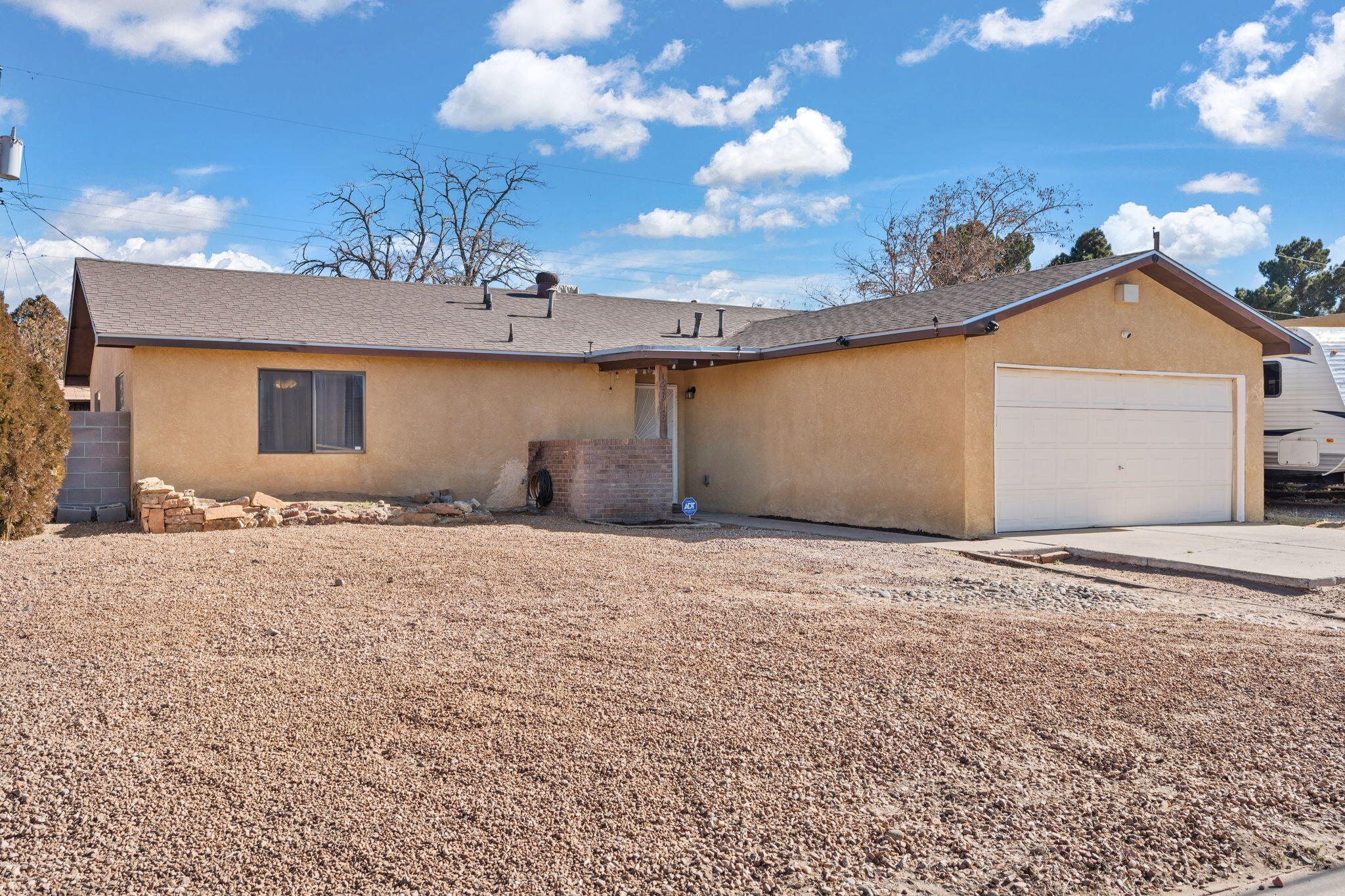 This lovely 3-bedroom, 2-bathroom home offers the perfect blend of warmth and functionality, with thoughtful features designed for everyday living. Enjoy the generously sized living room, the ideal space for entertaining or unwinding, complete with a cozy wood-burning fireplace to keep you warm on those cool New Mexico evenings. The home's layout ensures a seamless flow between the living areas and the kitchen, making it easy to host gatherings or enjoy quiet family dinners. Don't miss your chance to make this charming property your own! Schedule a showing today