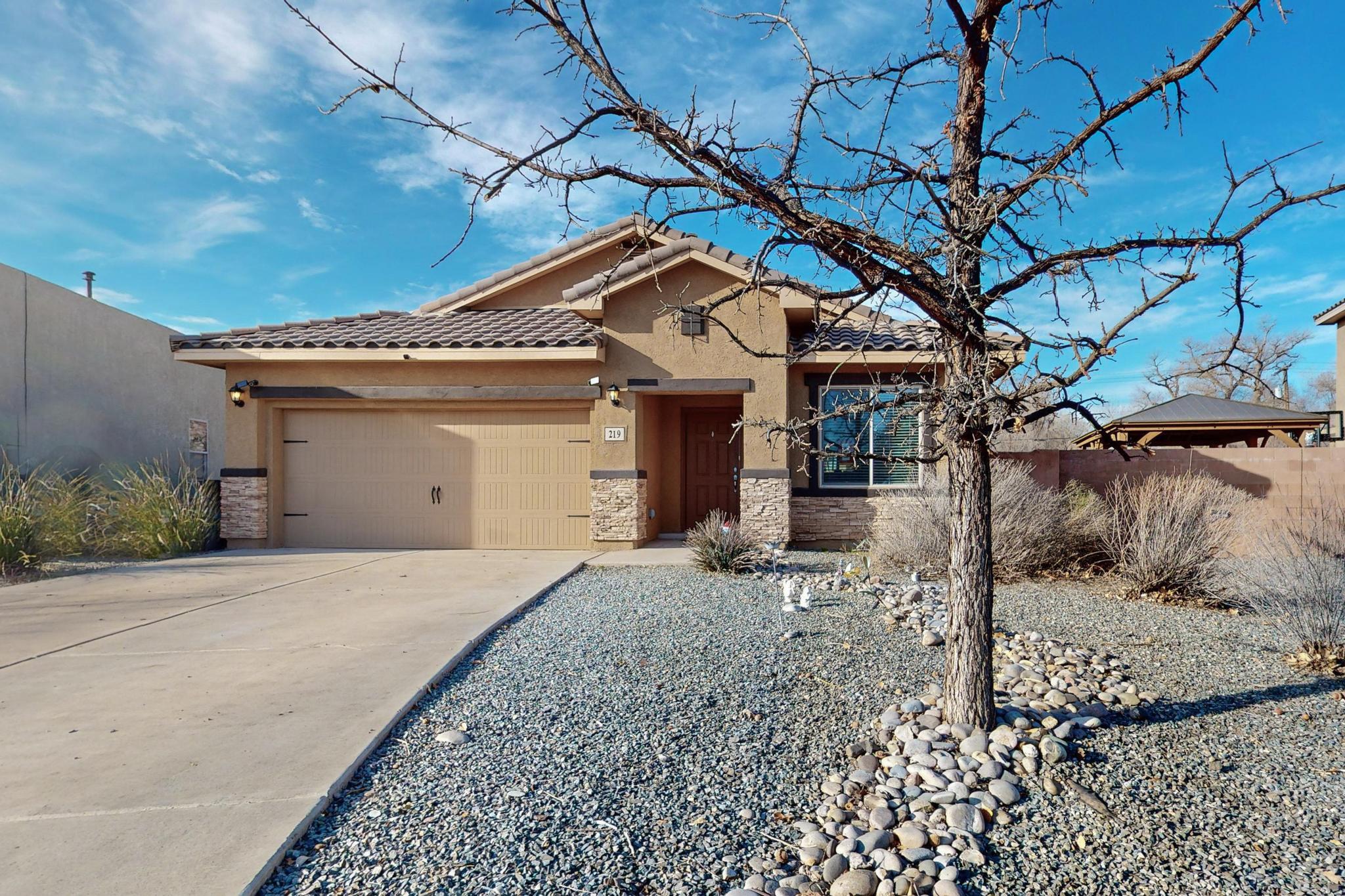 Welcome to this beautiful 3-bed, 2-bath home in the exclusive, and gated Sunset Farm neighborhood with unobstructed views of the Bosque. Home features an open floorplan, soaring ceilings, and an owned solar system for a huge electric bill impact. If you enjoy visiting Old Town, enjoying all the the BioPark has to offer, walking or biking on the Bosque trail and/or fishing at Tingley Beach, this is your new home!Seller is offering a $5K flooring credit.