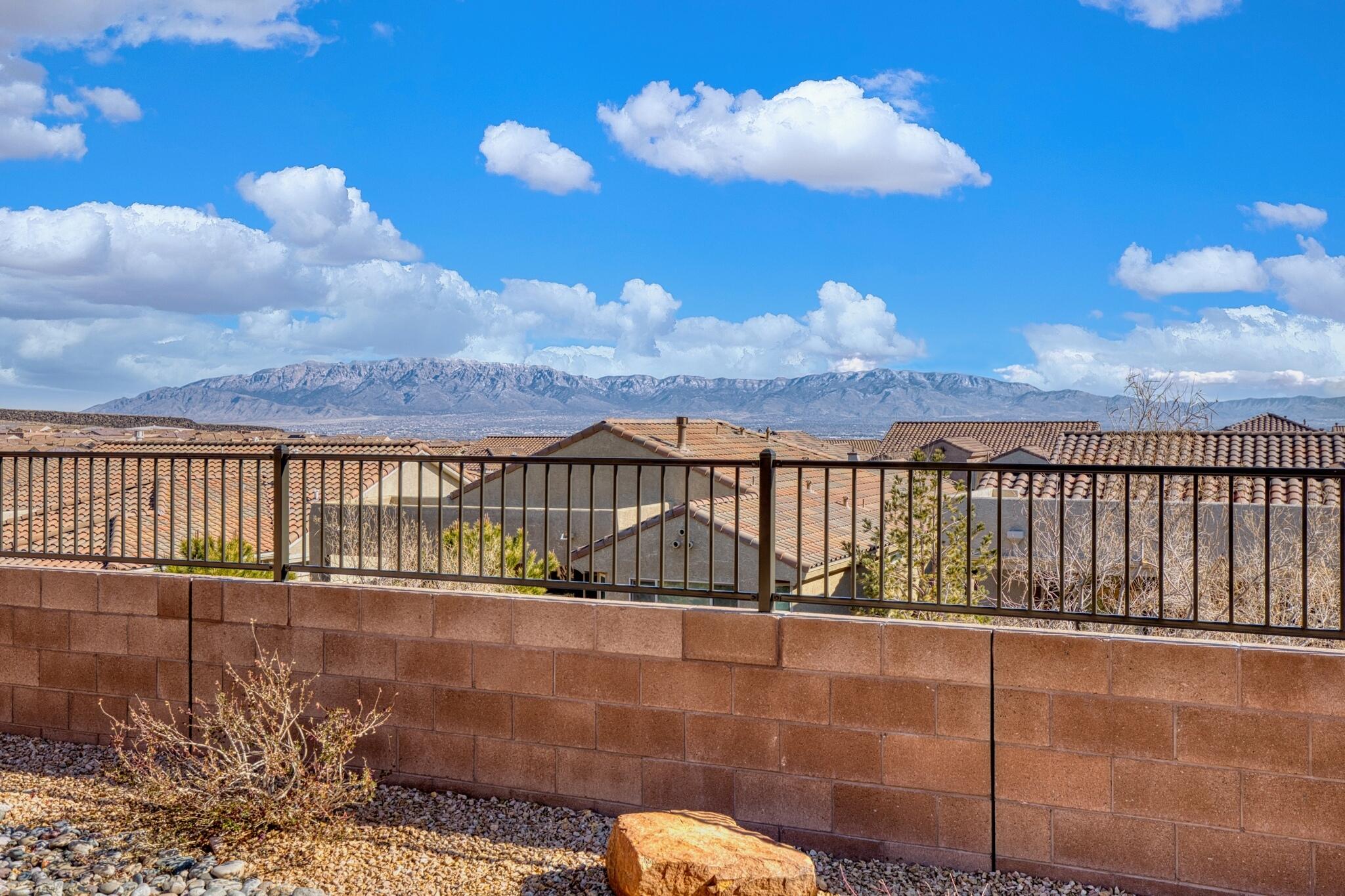 Beautiful Home with FOREVER VIEWS located in Del Webb Mirehaven 55+ Active Adult Gated Community!  Built on a Premium View Lot, this home has 2070SF, 3 BR's, 2 BA's & Extended 4FT 2CG w/Storage Area & Mud Sink! You will love the views from the Living & Dining Rooms, Kitchen & Primary BR!!! Original Owner meticulously maintained the home from top to bottom! Brand New Windows from 'Window World' on all East facing rooms coming soon(LR, DR and PBR)!! Gorgeous Custom Metal Storm Door! Plenty of storage throughout! Kitchen has Large Island, Granite Countertops, Pantry, Gas Stove! Primary Bath has huge walk in shower w/tile  surround! Many of the furnishings are negotiable & all appliances stay! Enjoy the Sandia Amenity Center for Daily Activities, Pickle Ball, Tennis, Pool, Gym. See More!!
