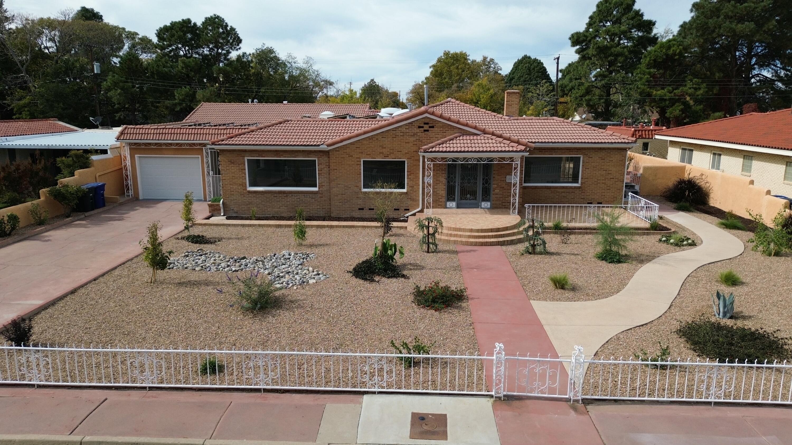 Welcome to this charming and spacious home in the heart of Albuquerque, minutes from UNM & Nob Hill. This well-maintained residence offers a blend of comfort and style, perfect for those seeking a relaxed lifestyle. Step inside to find an inviting living area with plenty of natural light, completely remodeled throughout, with new appliances. Owned solar panels. Electric bill less than $10 per month for over 5000 sqft of home. Come see today! Owner Financing is available.