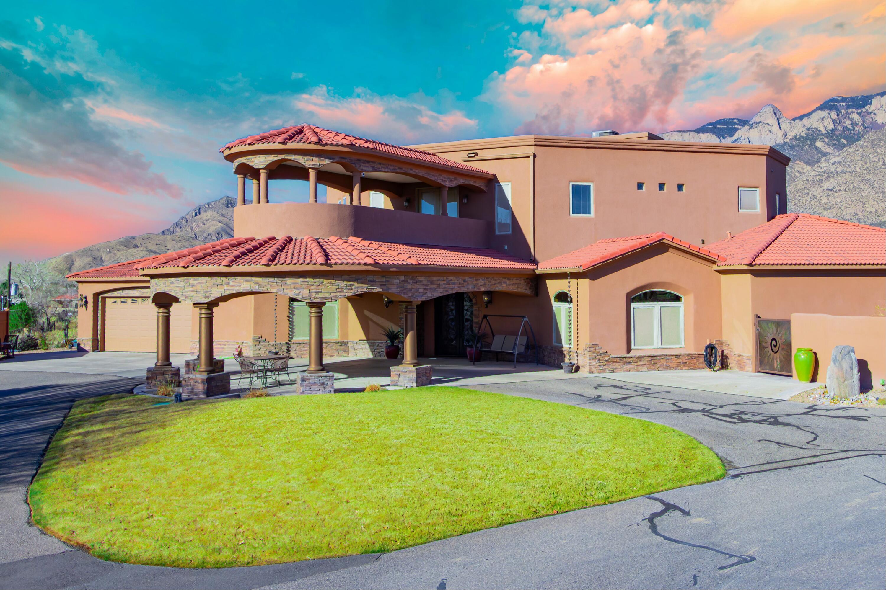Experience Unparalleled Luxury in This Stunning 3-Story Home. Welcome to a home that redefines sophistication and comfort. This impeccably designed 3-story estate features 4 expansive bedroom suites, each a private sanctuary with spa-like bathrooms and custom walk-in closets. A chef's dream kitchen awaits, equipped with premium stainless steel appliances, sleek countertops, and a layout perfect for creating culinary masterpieces. The recreation room is an entertainer's delight, complete with a wet bar and a nearby full bathroom. Enjoy cinematic experiences in the state-of-the-art theater room or work out on the third-floor gym area, where you can step out onto a covered balcony to soak in breathtaking mountain views. Two grand spiral staircases serving as architectural focal points and