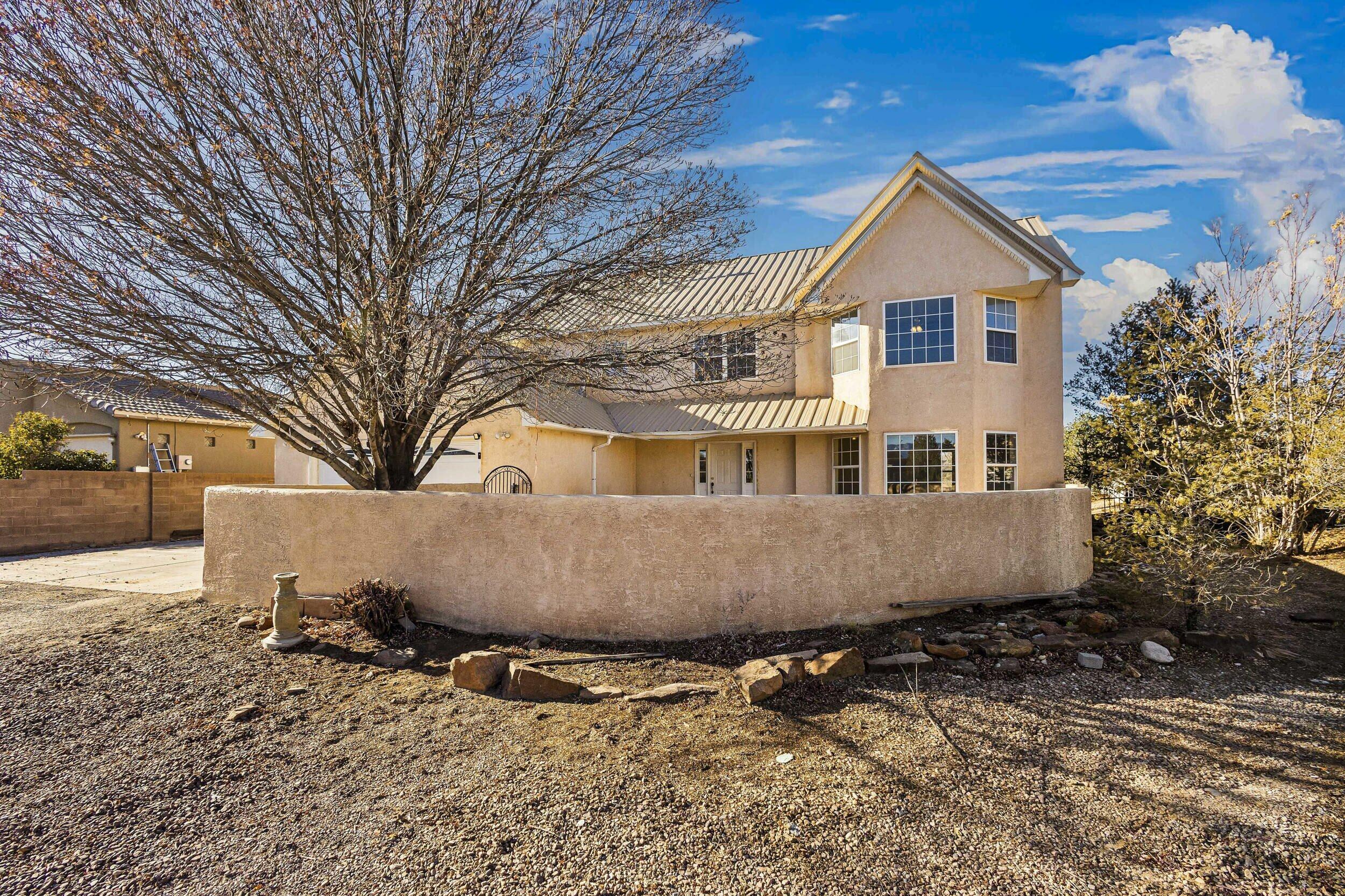 ''This was our dream home, it was just what we wanted, the convenience of the city but not in the city. The hot air balloons are the best!'' said the owners of this lovely home on a generous .5 acre corner lot, complete with backyard access. Now their dream is taking them on the road these days so it's your turn to make your dreams come true! Wake up to the mountain views every morning & watch them turn their beautiful watermelon color every evening from your private courtyard. Bite into 2 different kinds of apples from the backyard! How about Tap & Taco? Just 2 min away! New water heater, new disposal; metal roof placed in 2019! What a great value in this neighborhood and one that doesn't come along often! Make your appointment today and don't let the dream get away!