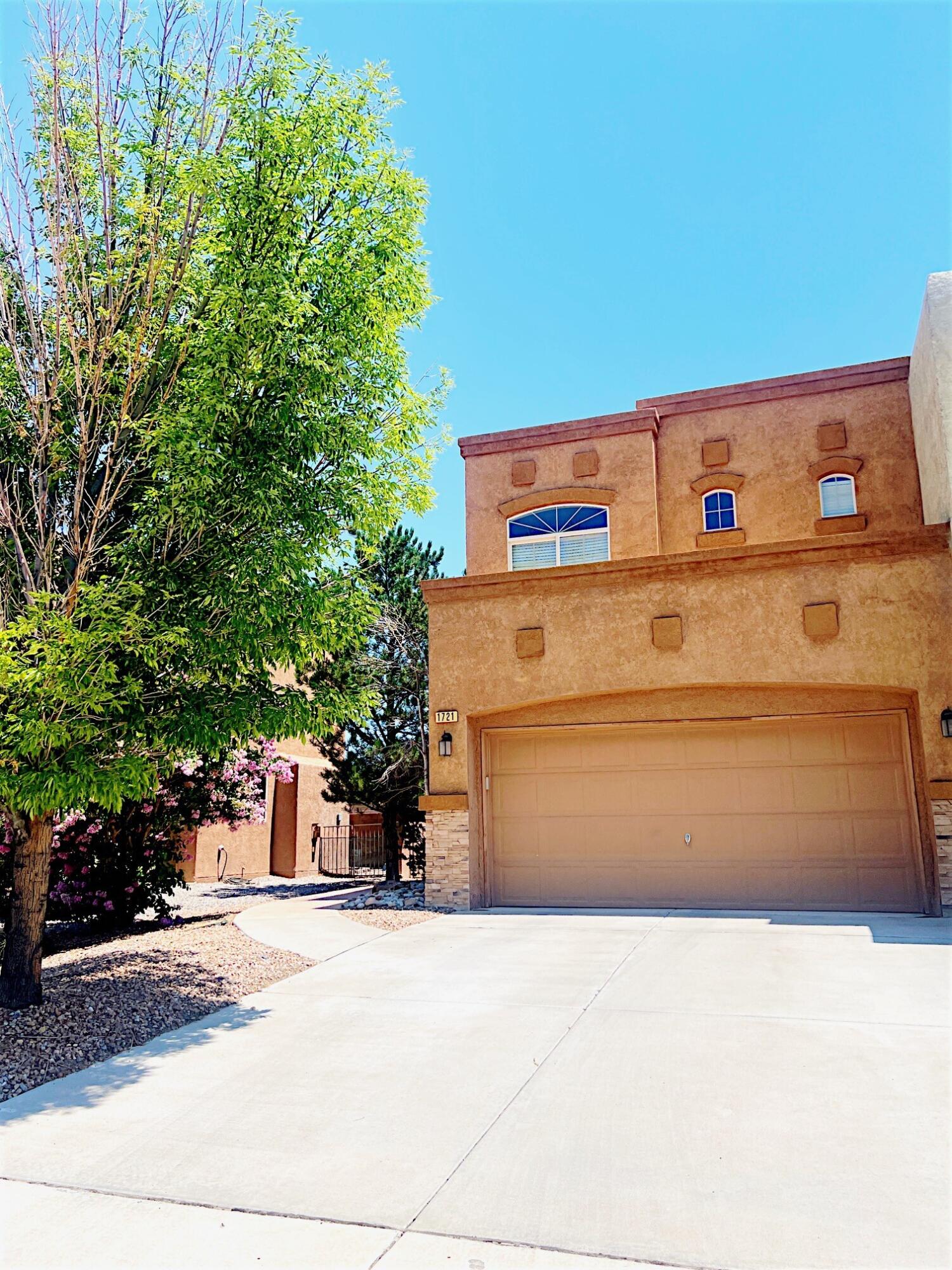 Charming Former DR Horton Model Home located in the highly sought-after Gated Community of Astante in Cabezon. This 2 Master Bedroom Townhome offers. Recently Updated- NEW ROOF,Gorgeous Front Door,Quartz Counters & Quartz Fireplace Surround, Designer Paint, Luxury Vinyl Flooring, Plush Upscale Carpet, Awesome Remodeled Powder Rm w Comfort Ht Toilets in All 2.5 Bth Rms! Open Flr Plan, Large Great Rm w Stunning Fireplace, Beautiful Open Kitchen w Fabulous Island Style Breakfast Bar, Upgraded Black Stainless-Steel Appliances.Refrigerated Air,Oversized Rooms w Huge Walk-In Closets and a Cozy Backyard including Soothing Rock Waterfall to enjoy those Amazing NM Nights. Close to Community pool,Rust Medical center,restaurant's, shopping center,walking trails,parks and so much more. Do Not Miss!