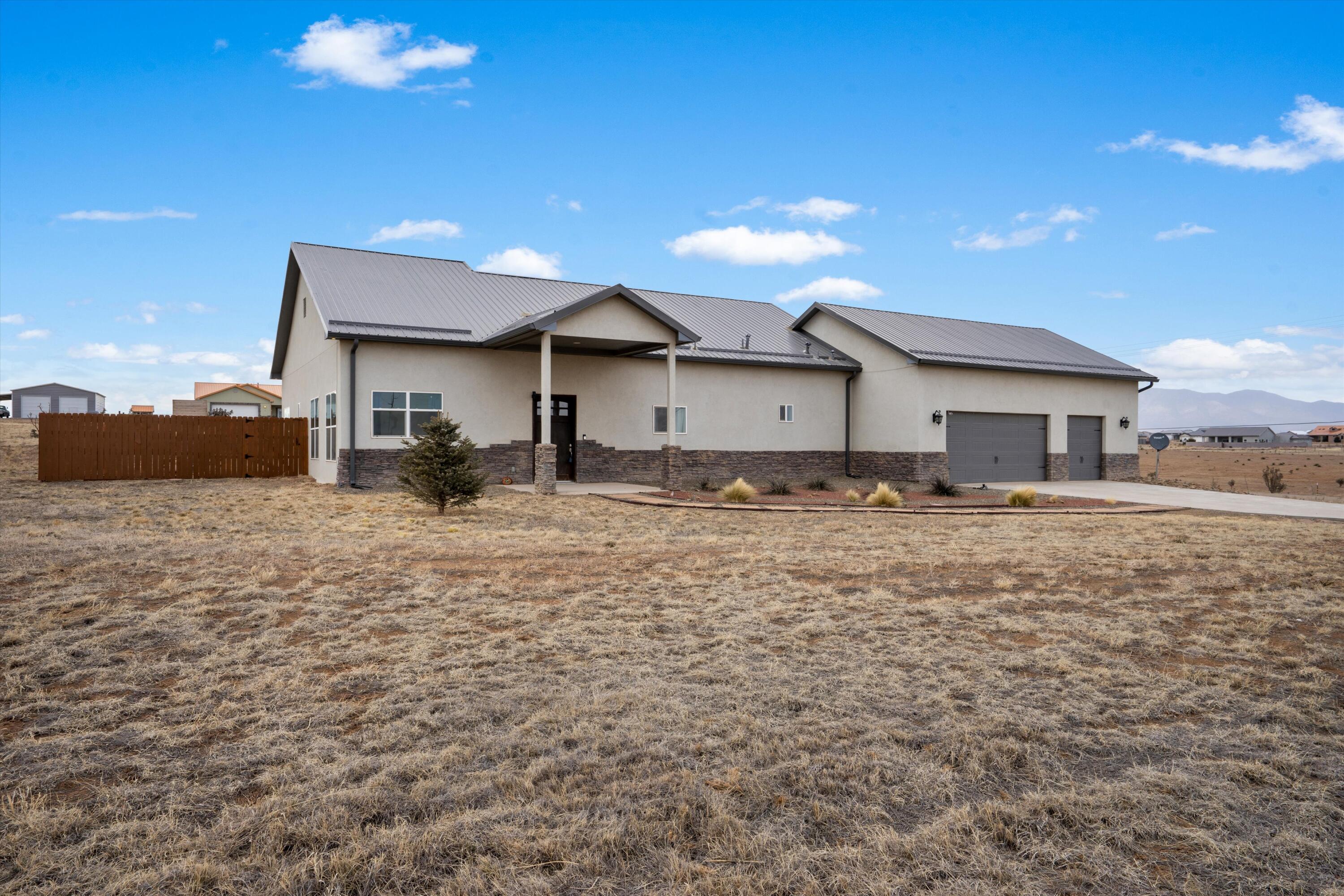 Assumable VA loan at 2.625%. Welcome to 2 Hayward Ct, a spacious and well-maintained home offering the perfect balance of comfort, privacy, and convenience. This charming property is located on a generous 2+ acre lot in the peaceful community of Edgewood, NM, and is only 30 minutes from the vibrant heart of Albuquerque, making it ideal for those who want a serene retreat without sacrificing easy access to city amenities. Property Highlights:4 Bedrooms, 3 Bathrooms: This spacious home provides ample room for family living or guests, with a flexible layout that accommodates a variety of lifestyles.Expansive Lot: Set on over 2 acres, the property offers plenty of space for outdoor activities, gardening, or potential expansion.