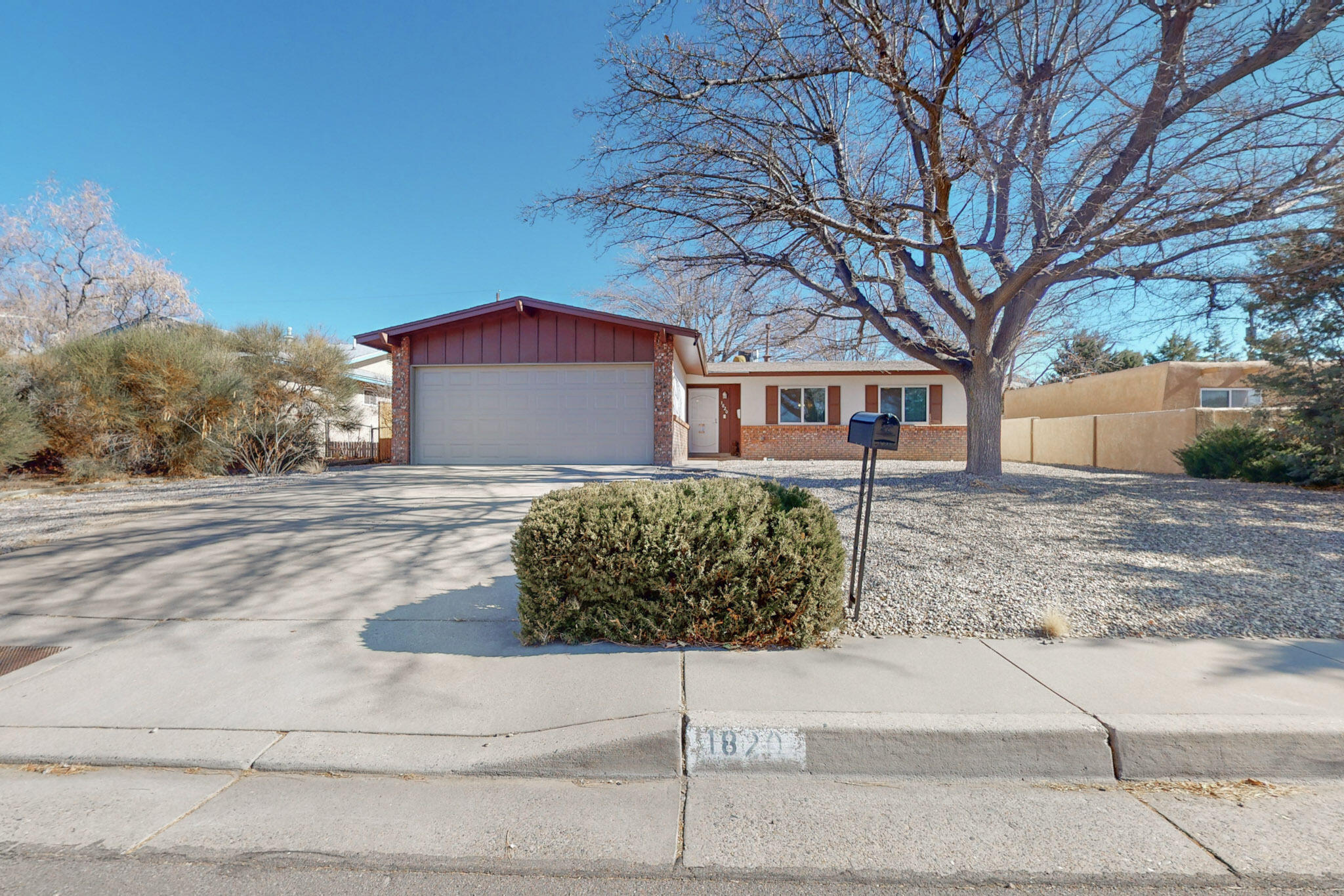 Discover this charming 3-bedroom home nestled in a quiet cul-de-sac at 1820 Nakomis Ct NE, Albuquerque. Boasting an open floor plan and a spacious Great Room, this home has been thoughtfully updated with gas fireplace installed in June of 2024, upgraded cabinets, granite countertops with backsplash, and modern stainless appliances, including a self-cleaning gas range, microwave, and dishwasher. Other upgrades include roof insulation, fixtures, bathrooms, window coverings, doors, refrigerated air, disposal, water heater, and more. The oversized 2-car garage provides ample space, while the large lot offers backyard access possibilities. Perfect blend of style, space, and convenience!