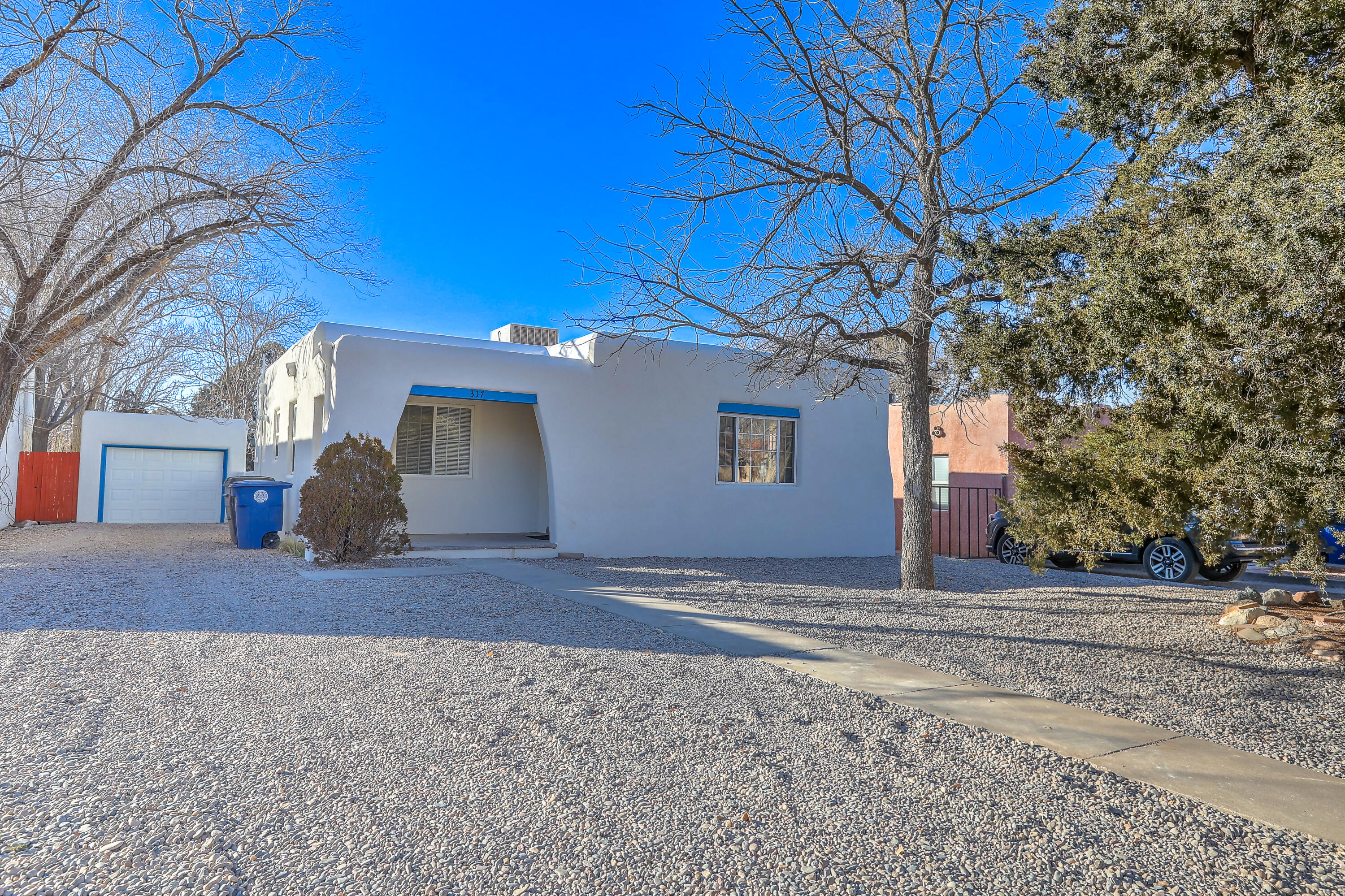 Discover the Ultimate Renovated Gem in University Heights!  Step into this stunningly updated bungalow in the heart of one of the city's most vibrant neighborhoods. From the moment you walk through the door, you'll fall in love with the open-concept kitchen/dining area, featuring sleek updated cabinets & modern appliances. Enjoy the warmth & character of refinished wood floors, complemented by the light from the updated windows throughout. The freshly stucco exterior is just the beginning--imagine entertaining in the spacious backyard with alley access or envisioning the potential for a guest casita or ADU. To top it off, this property boasts a detached one-car garage, offering convenience & extra storage. This home is the perfect blend of modern comfort & timeless charm!