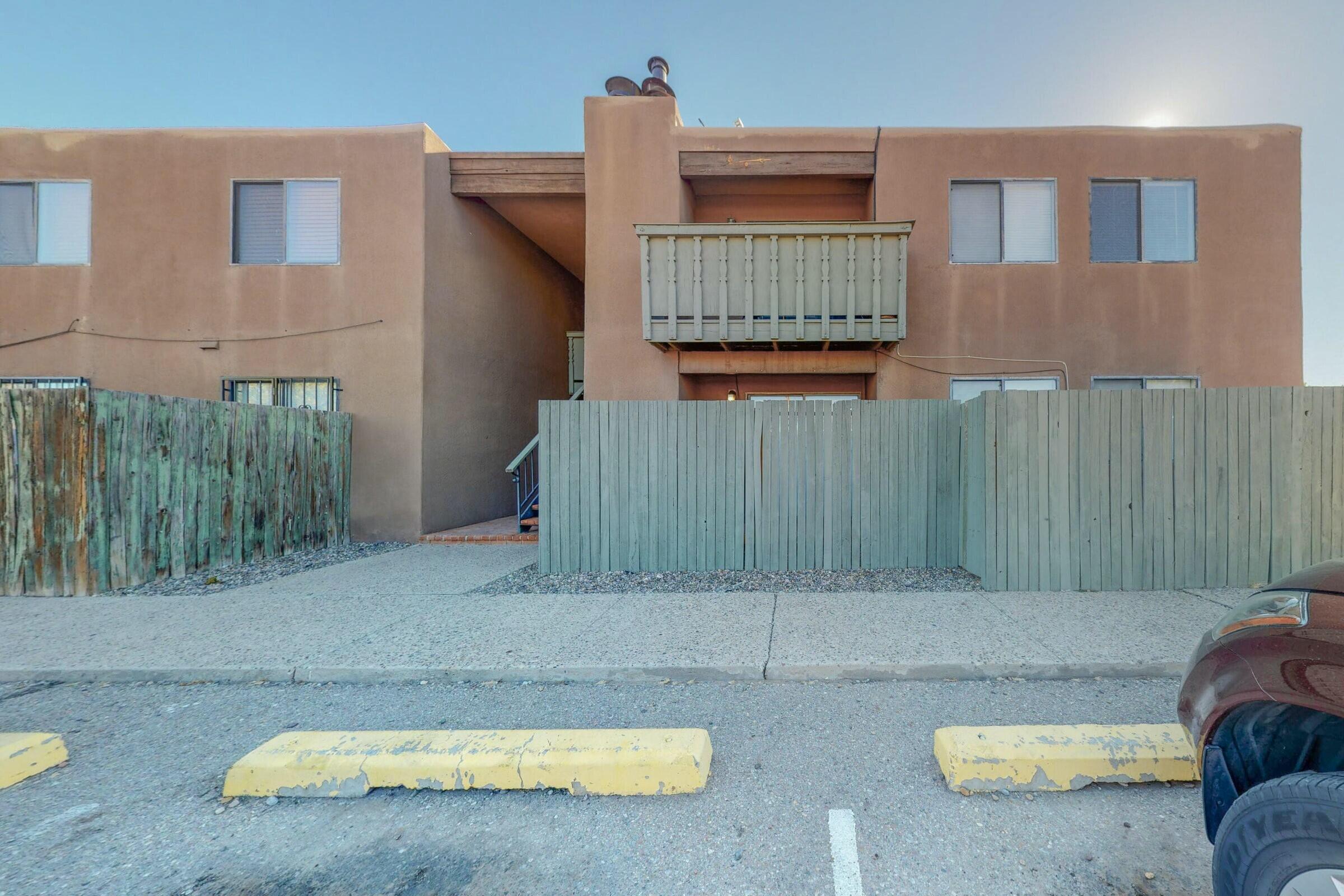 Great opportunity, nestled in the South Valley of Albuquerque. Located in a very secluded location near the historic Route 66. La Vida Nueva del Oeste is a convenient condo style living with privacy walls, gates, storage, and designated parking. It is in a very eccentric part of town, near multiple restaurants, Old Town, Downtown, access to the freeway and surround by major shopping centers. Lots of amenities and recreational parks surround the area.   Move-in ready condo with 3 bedrooms, two bathrooms, a private balcony and a wood burning fireplace. You will not find a real property at this price featuring multiple bedrooms, bathrooms, and the location. Call us to take advantage of this opportunity!  Owner to owner financing available.