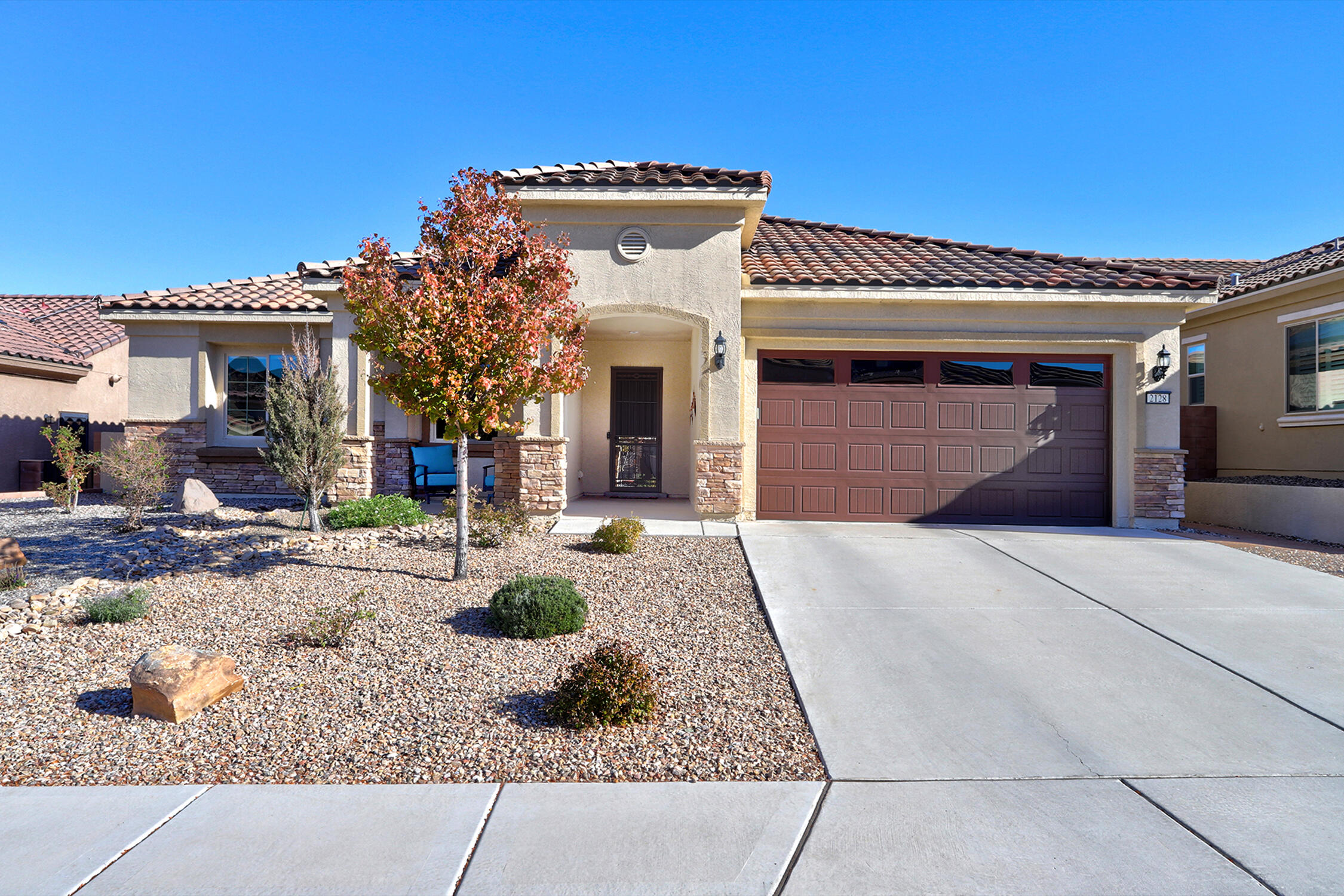 Gorgeous Home in Del Webb Mirehaven a 55+ Active Adult Community! This 'Pursuit' floorplan is 2092sf w/2 BR's, 2 BA's, Office/Den or 3rd BR, 10' Ceilings, Oversized 2 Car Garage w/4 FT Extension, Storage Area & Metal Shelving, Workbench & Epoxy floor! Original Owners added many upgrades: OWNED SOLAR PANELS,  Custom Backyard Landscaping & Stuccoed Wall to match home, Custom Window Coverings, Security Door & Side yard Gate, Sun Shades at back Patio, Gutters, w/Rain Barrels, Gas Grill Stays! Stacked Stone added to Face of Home! Kitchen includes large Island, Tile backsplash, Pantry, Range Hood, Gas Cooktop, SS Appliances. All Appliances Stay! Laundry Rm has Add'l Cabinets & Sink! REF AIR! Most Furnishings are Negotiable! Enjoy the Sandia Amenity Center w/daily activities & so much more!