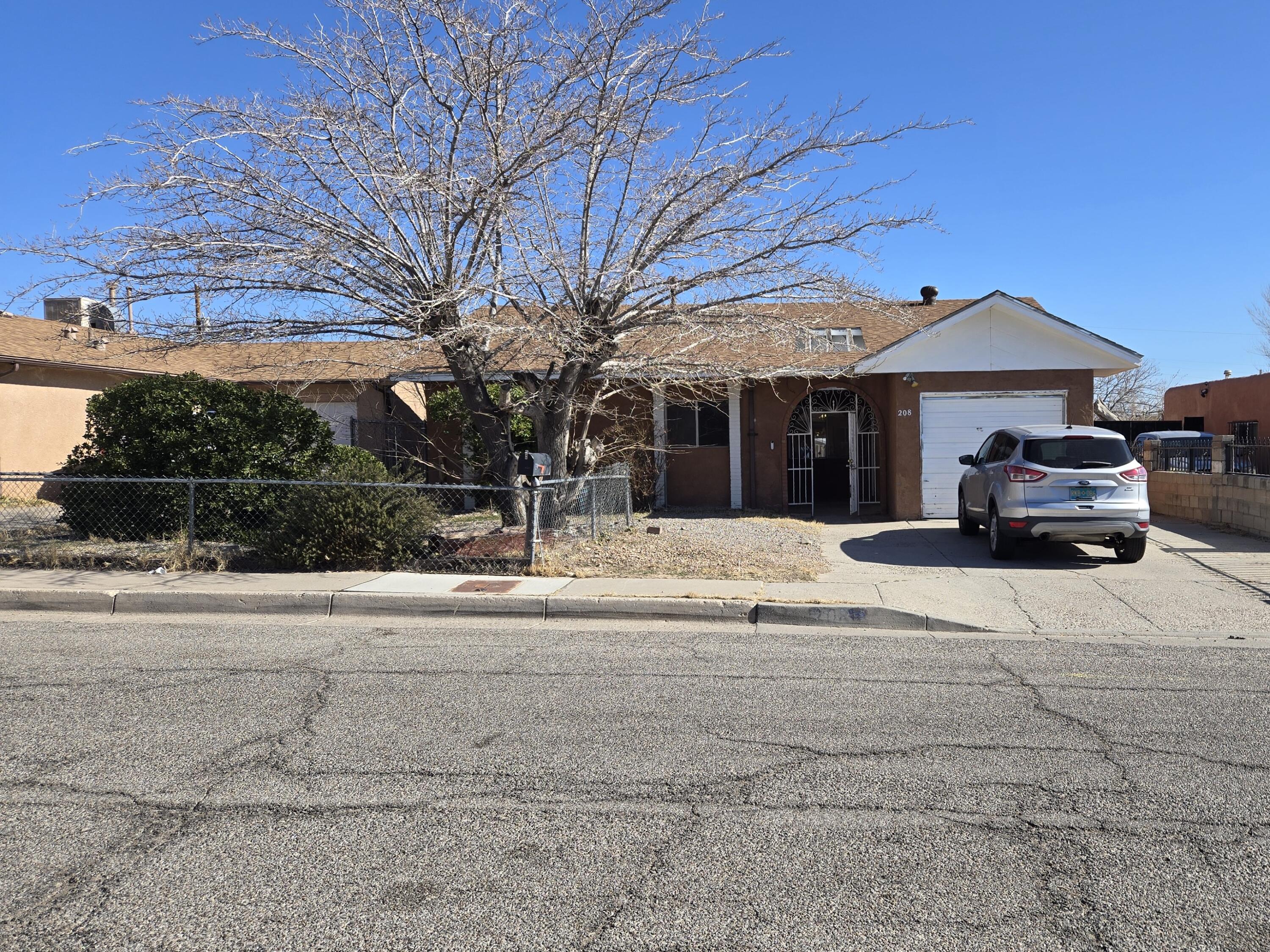 Great opportunity to make this your home sweet home.  Home needs a little fixing up.  Features 2 living areas, 3 bedrooms, 3 bathrooms, large backyard, Close to Route 66, schools, stores, major highways.  New roof in August 2022, new water heater a year ago, Security system with google camera on front.  Come take a look before it is gone!!!