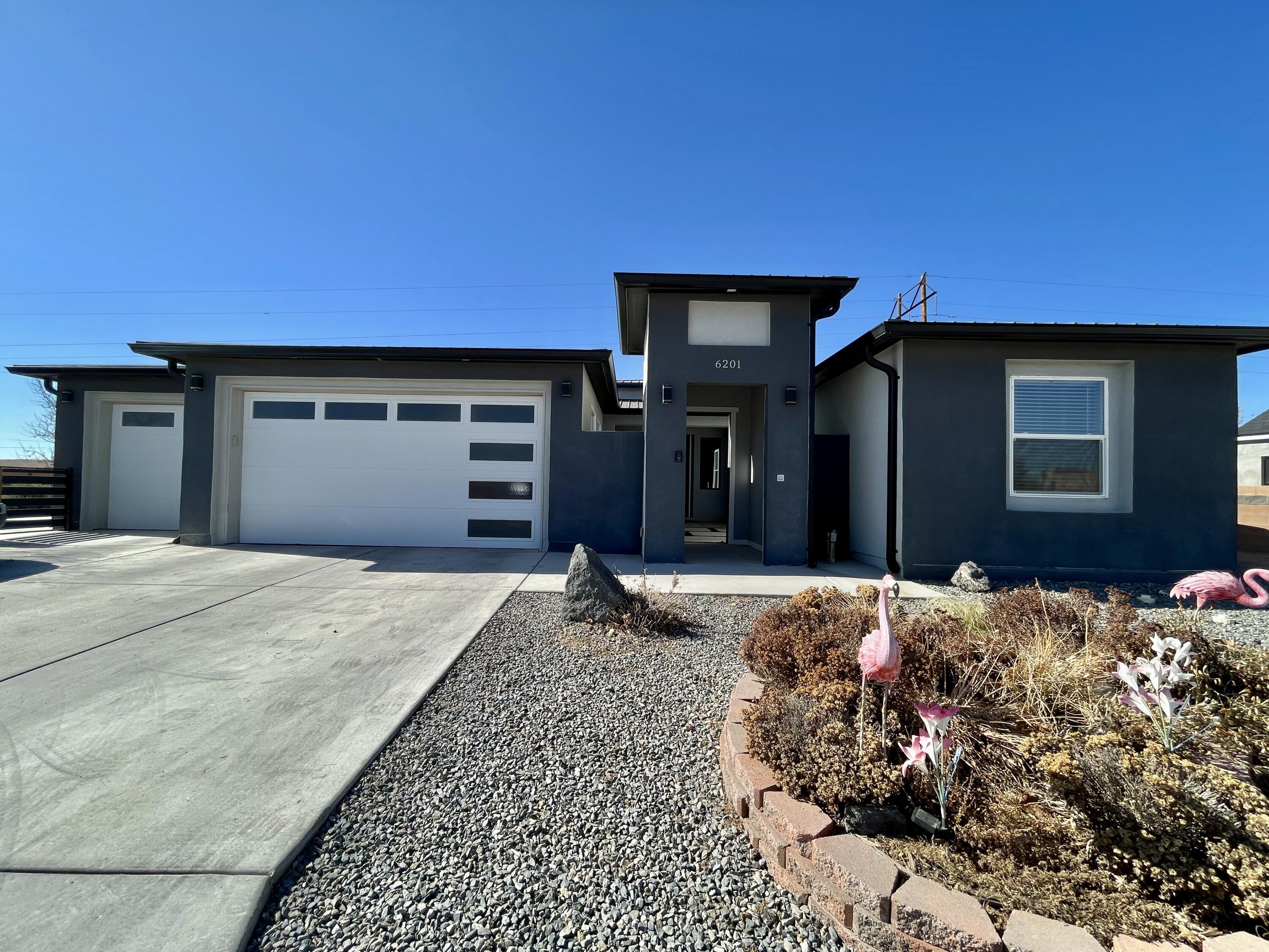 Welcome to the Volcano Cliffs Subdivision. Million Dollar Views all around. This house has a rooftop balcony that has panoramic views of the Mountains, City and Volcano's. This house was built a little over 2 years ago in this very Desirable neighborhood. There is plenty of room for a big family or if you want to have get togethers. there are 5 bedrooms a large open concept kitchen with 2 living areas or you can use one as a dining area. It is in very quiet area, but is still close to stores and restaurants. A Very Beautiful home that you don't want to miss.