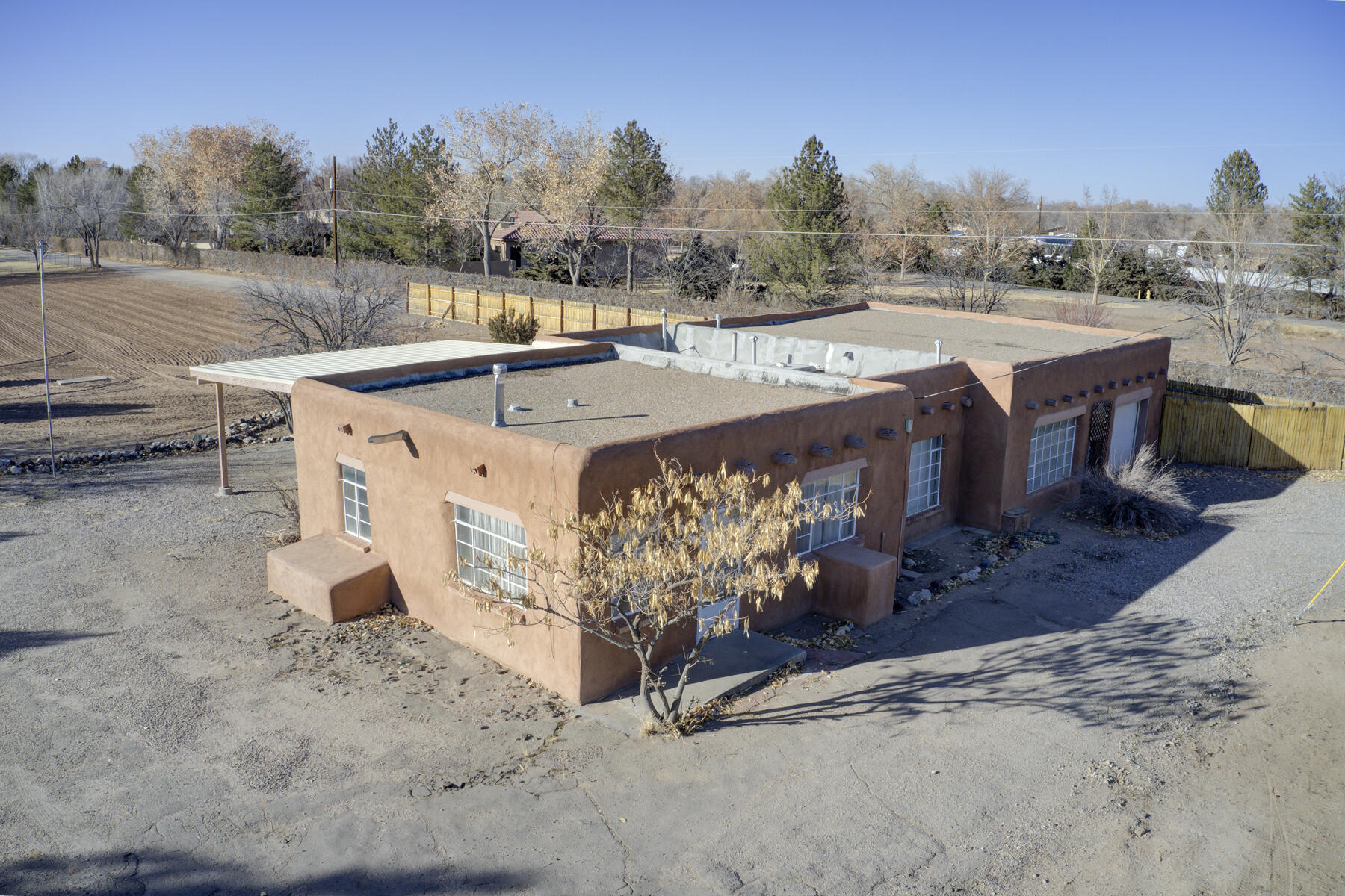 Fantastic 1 1/2 Acre in Prime North Valley Location. Old Adobe home with Character and Huge Garage or Workshop can be remodeled or Built on to. Or you might choose to tear it down because it needs a lot of work and build your New Custom Dream Home. Home will not Qualify for FHA or VA Loans. The Value is in the Acreage. Possibly use the Old Abode as Guest House, Art Studio, Barn or Garage, but Home is being Sold-As-Is. No repairs, No Warranties.No HOA's. Lot's of Options. Rare Opportunity like this doesn't come around often!.