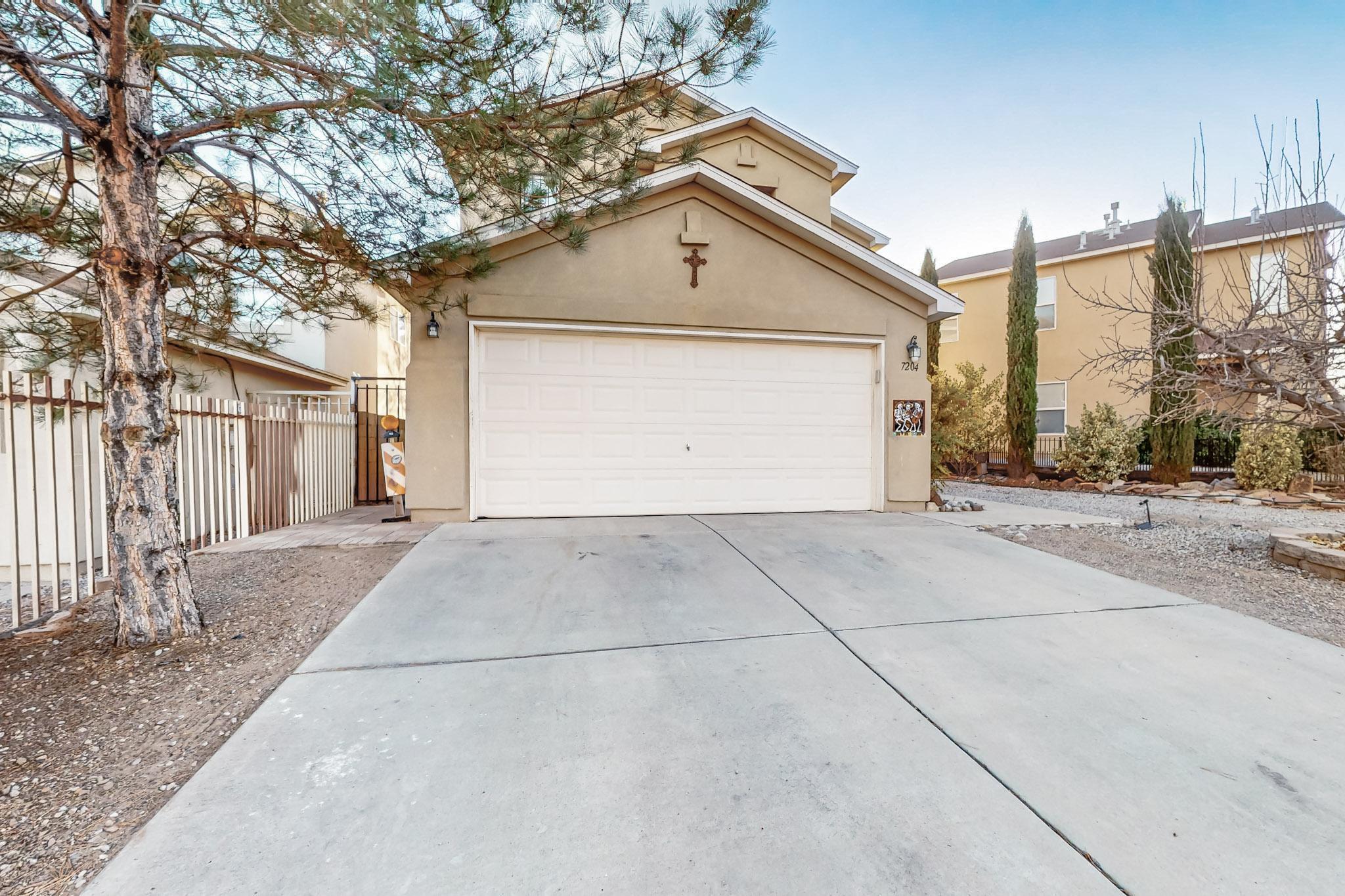 Welcome to your dream home! This stunning 3-bedroom, 2-bathroom gem offers 1550+ sq ft of modern living space in the highly desirable Southwest Albuquerque area close enough from Unser and the Freeway but tucked away on a quiet block. Step inside to find an open-concept floor plan with a spacious living area, perfect for entertaining family and friends. The kitchen boasts stainless-steel almost new fridge, and a large island for meal prep or casual dining.Retreat to the primary suite upstairs. There are two full baths upstairs and half down. The very spacious and private fully landscaped backyard is ready for your personal touch, offering plenty of space for outdoor gatherings or peaceful evenings under the New Mexico sky.Conveniently located near schools and parks Box on Front.