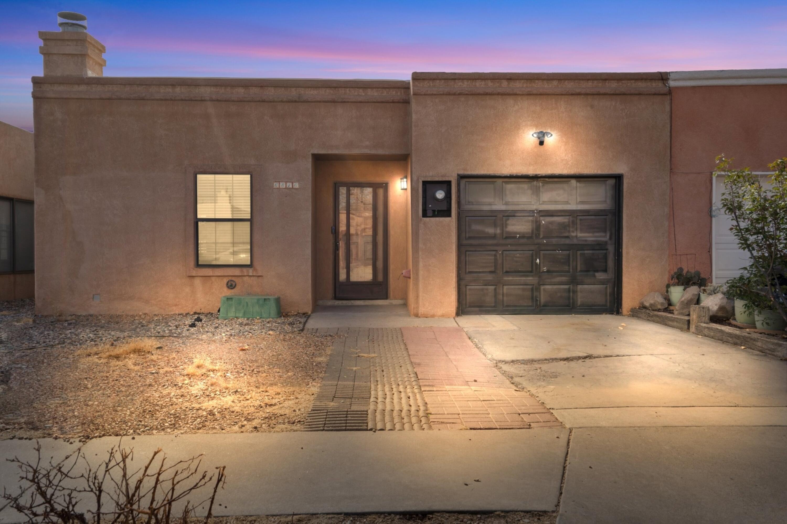 Beautifully Updated 3-Bedroom Home in Albuquerque! This move-in-ready 3-bedroom, 2-bathroom home with a 1-car garage offers modern updates and comfortable living. The home features a newer roof, remodeled kitchen with stainless steel appliances and wood butcher block countertops, and updated bathrooms with stylish finishes. Fresh interior paint, new ceiling fans in the living area and all bedrooms, and a mix of laminate flooring and carpet provide a fresh and inviting feel throughout. The spacious primary bedroom includes two closets for ample storage. A dedicated laundry room with shelving adds convenience. Ring doorbell in use. Washer/Dryer do not convey. Please note: 1 hour seller notice for all showings. Don't miss this opportunity to own a beautifully updated home. Schedule your