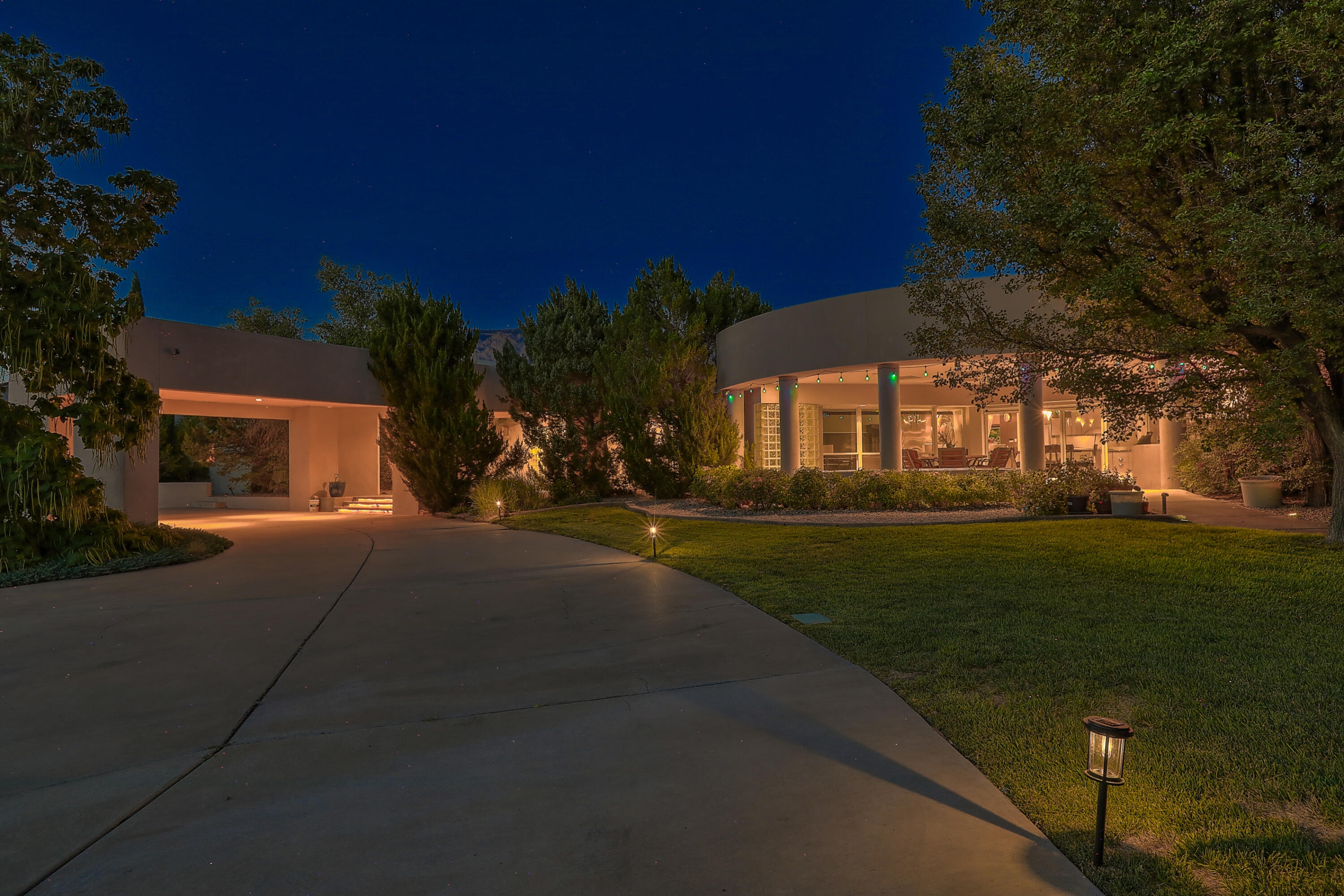 **Luxury North Albuquerque Acres Retreat with High-End Amenities** Welcome to your dream home--a stunning luxury estate that combines modern sophistication with unparalleled comfort. This property boasts a **TPO roof** installed in April 2024, ensuring top-notch durability and energy efficiency. Security and privacy are paramount, with **double security gates to enter the estate*** Step outside to discover your very own private oasis. The expansive **50x25 foot pool**, paired with a hot tub, offers breathtaking mountain views that will leave you speechless. For those with a green thumb, the property features **garden beds, a chicken coop, and a private orchard** filled with apple, pear, and apricot trees.