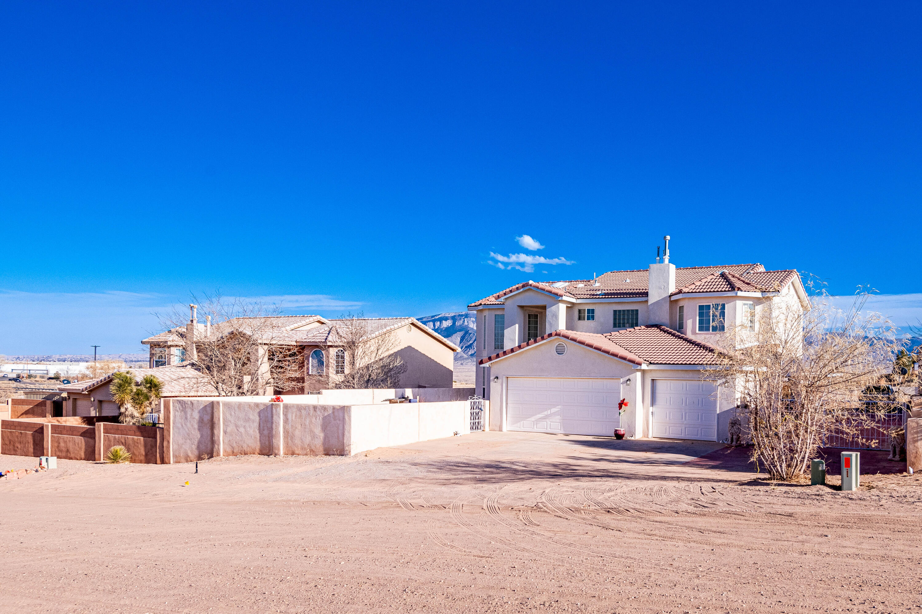 PRICE REDUCED! Very Spacious 6 bedrooms and 3 full bathrooms Rio Rancho home sitting on a half an acre. Title throughout the home, granite counters in kitchen and bathrooms. The three-car garage and back yard access offer the room and convenience to store your RV, ATVs and/or other vehicles. The covered patio is perfect for those summer gatherings with a great view of the Sandia Mountains. Schedule your showing soon.