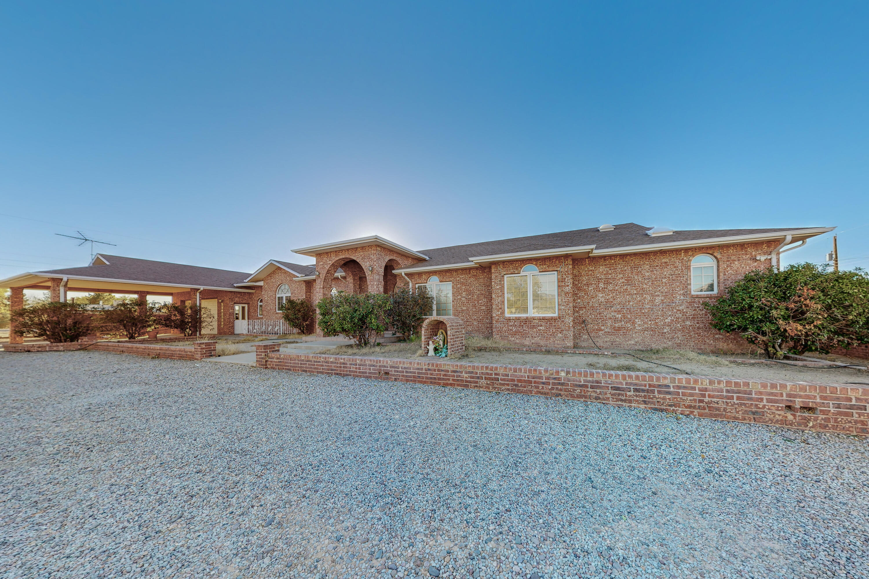 A most unique property in the heart of the North Valley. An executive, custom-built principal residence, a huge workshop-garage, a one-bedroom apartment, and a site-built storage area-- ALL on a large, ''almost an acre'' lot -- WITH VIEWS!!! RESIDENCE: All Pella Windows throughout; Two Separate Air/Heat Units; All interior walls insulated; Space to Spread out! PLUS A HUGE FINISHED Basement with LOTS of possibilities!  WORKSHOP-GARAGE: Overhead Door; High Ceilings; Room for at least SIX automobiles or Two Full-sized RVs. Equipped with Tools (Included!); APARTMENT: 800 SF; One Bedroom plus LR, storage area & Kitchen. STORAGE BUILDING: Previously used as an apartment. GREAT OPPORTUNITY here! Come Take a LOOK!!  *** Buyer Brokers: Please See LO/SO. ***