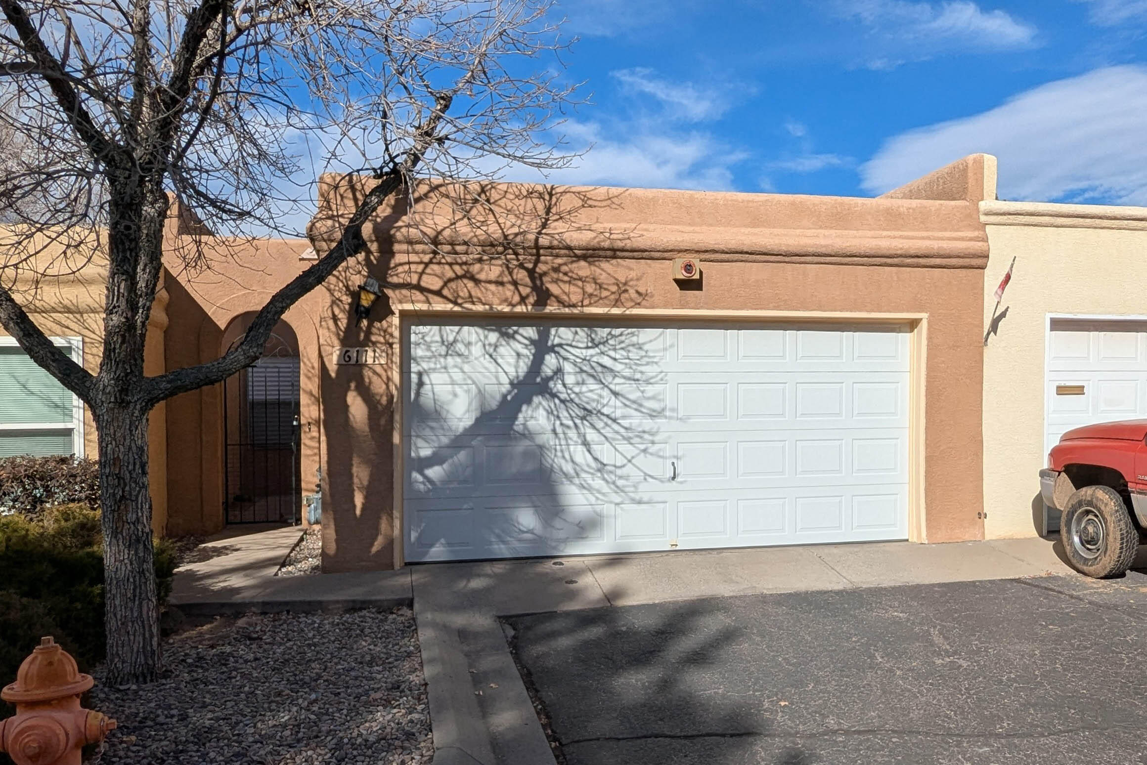 This lovely townhome has a large living room with fireplace. Kitchen is highlighted by granite countertops. Two spacious bedrooms. Utility room has been updated with lots of built-in cabinets and counter space. covered backyard patio with gated access to community's open space and tennis court. Conveniently located near shopping, restaurants and quick access to freeway. HOA covers common area, pool, tennis court, clubhouse, water, trash and exterior of home including roof.