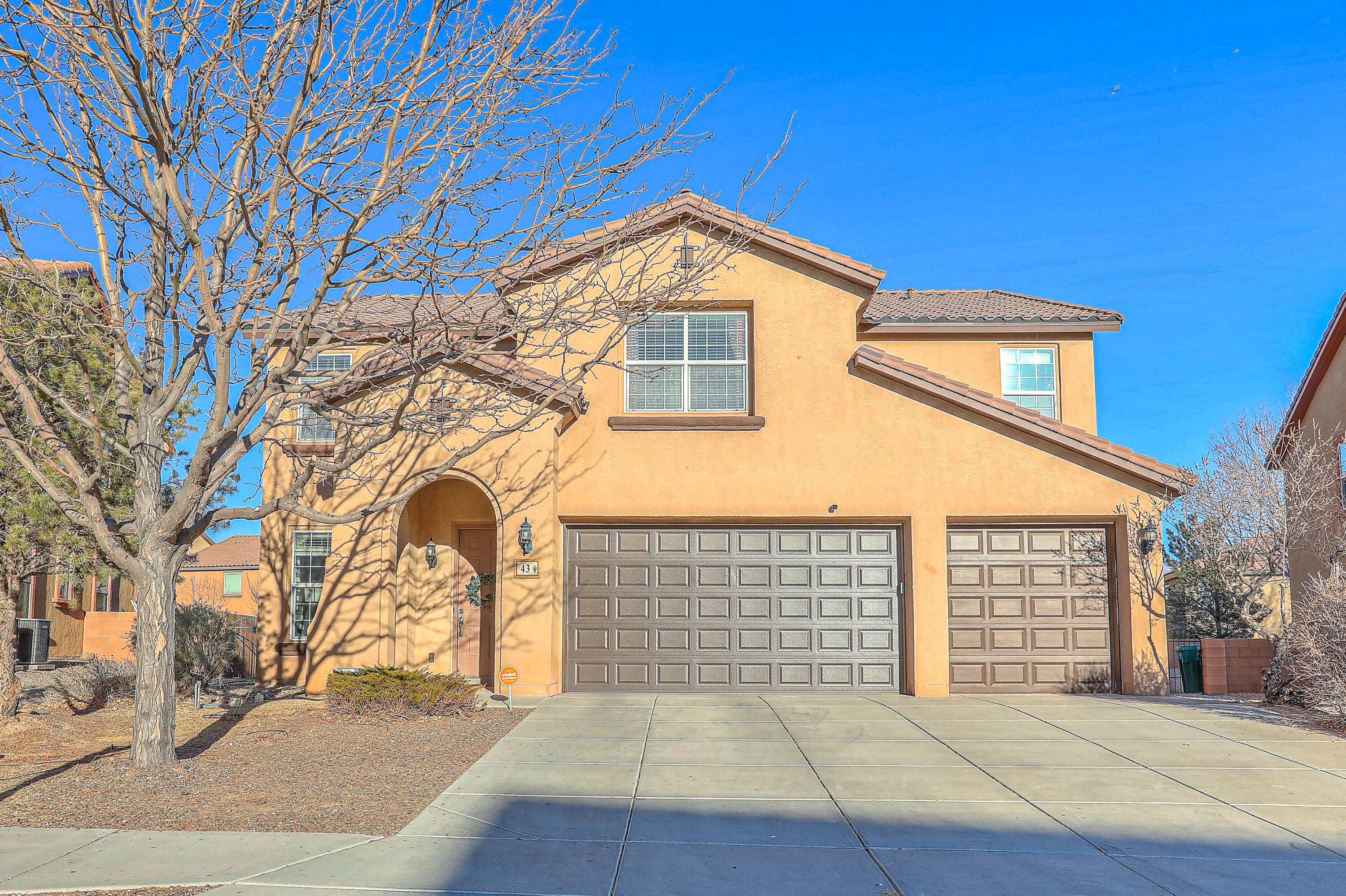 Nestled in the picturesque Loma subdivision of Rio Rancho, this stunning home offers a perfect blend of comfort and elegance. Spanning five spacious bedrooms and three well-appointed bathrooms, it provides ample space for both relaxation and entertainment. Upon entering, you're greeted by a bright and airy foyer that flows seamlessly into an expansive Living/Dining and Kitchen area. One bedroom, is located on the main level, with the additional FOUR bedrooms and a full loft upstairs! The open-concept layout enhances the home's inviting atmosphere, making it perfect for gatherings with family and friends. The gourmet kitchen boasts modern stainless steel appliances, ample cabinetry, Adjacent to the kitchen, the dining area overlooks the beautifully landscaped backyard,