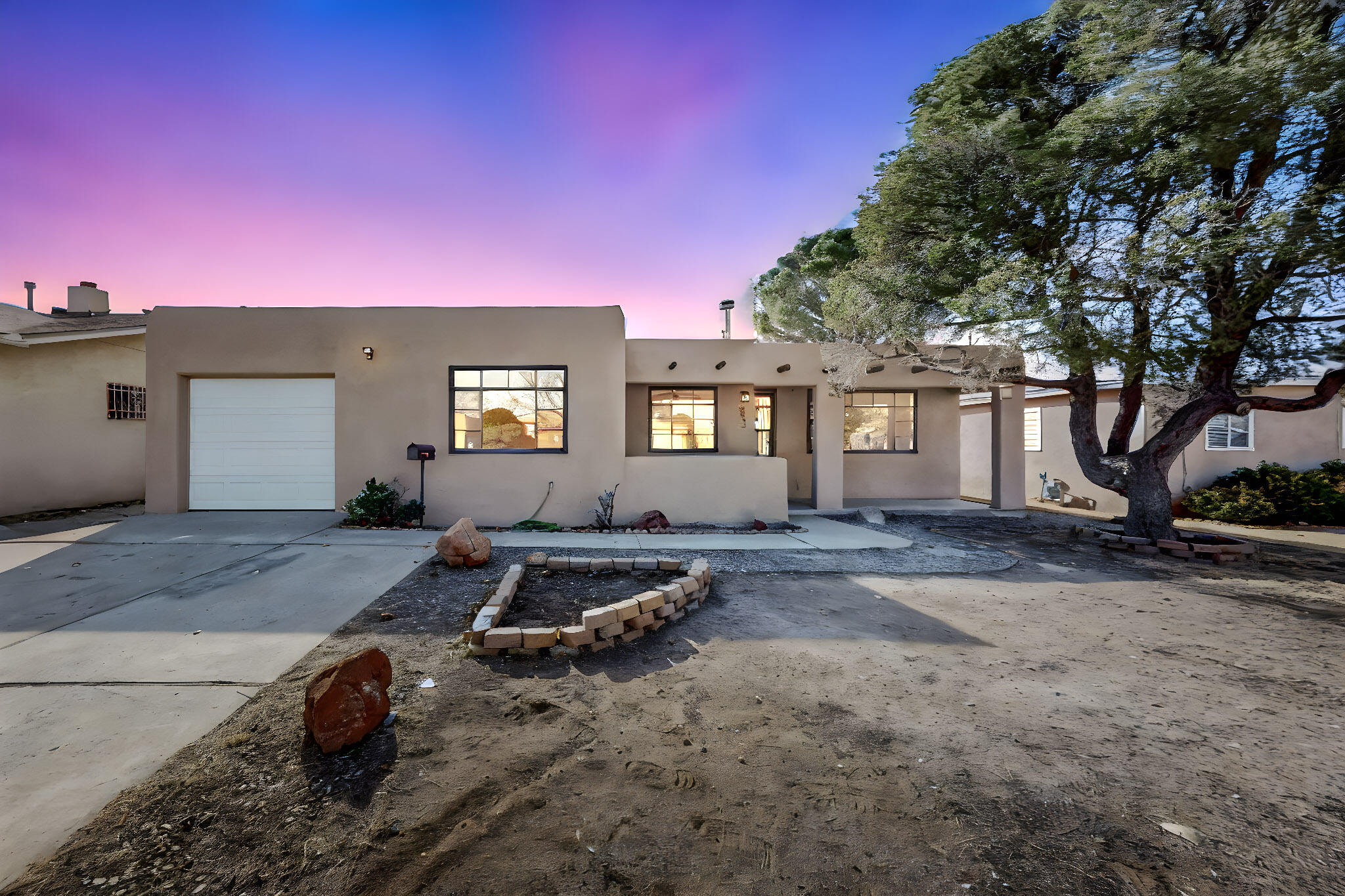 Welcome to this beautiful 3-bedroom, 2-bath home with a versatile bonus room--perfect as a 4th bedroom, office, or second den. Nestled in Albuquerque's sought-after Snow Heights neighborhood, this inviting home features two cozy fireplaces and generously sized bedrooms and den, offering plenty of space to unwind. Freshly painted interiors create a bright, welcoming feel. Includes washer, dryer, new dishwasher, and cooktop. Recent upgrades: synthetic stucco (3 months) and a newer roof (3 years) for lasting durability. Located in a top school district, this move-in-ready gem won't last long!