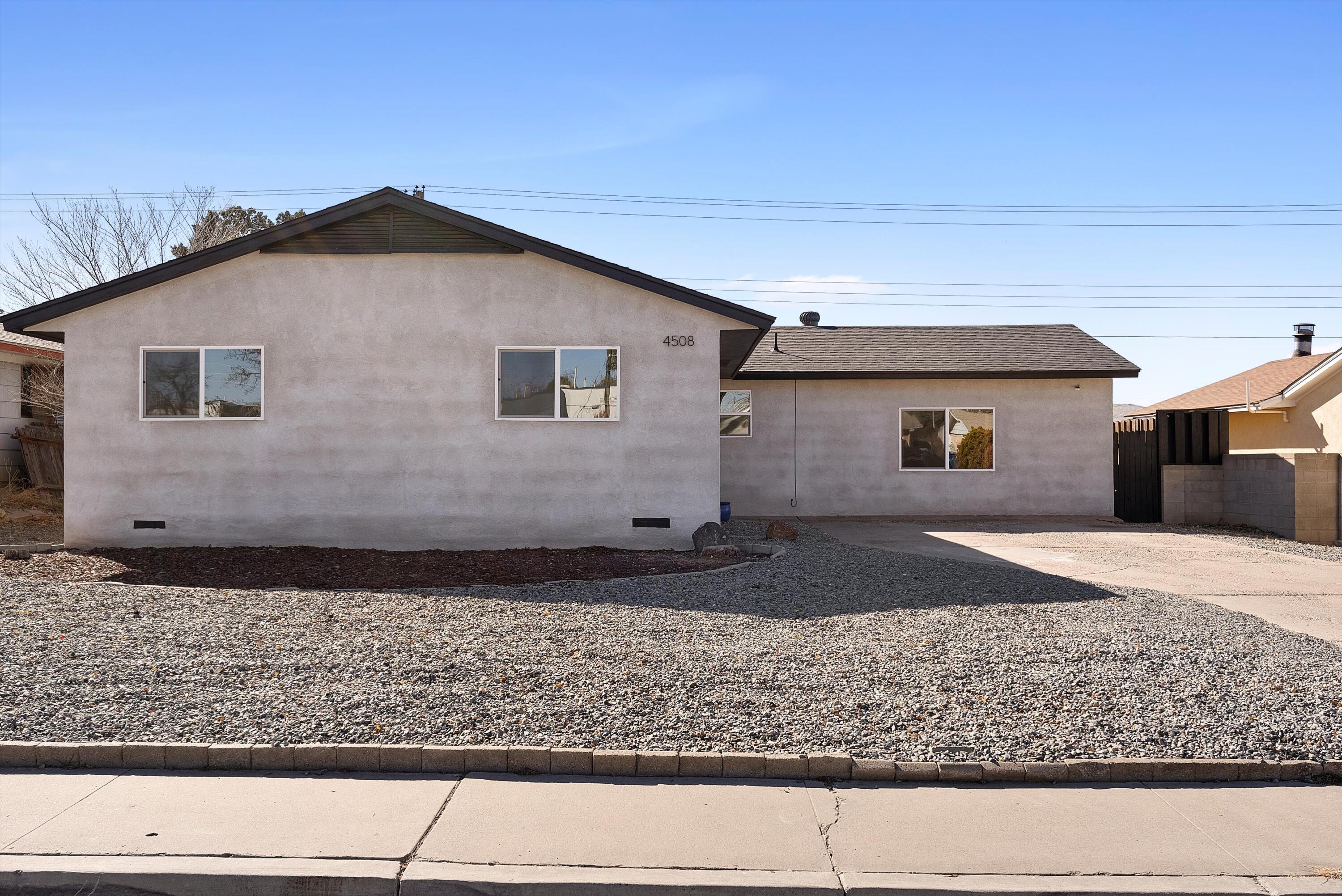 SELLER NOW OFFERING $10,000 BUYER CREDIT! Run don't walk! Come into this warm and bright remodeled home with two-tone interior paint, recessed lighting, sleek wood laminate floors and all white kitchen and baths! With a versatile layout you find the kitchen and all the living space on one end and the bedrooms tucked privately on the other side. The beautifully upgraded kitchen, with shaker cabinets, gleaming quartz countertops, and a custom subway tile backsplash make cooking a joy. Black stainless steel upgraded KitchenAide appliances convey and complete the white / black kitchen theme! Outside, fully enclosed backyard with dog run and complete with storage shed. Parks, shopping, and top schools are just minutes away! Extensive remodel in 2022, ask about ALL the updates!!!