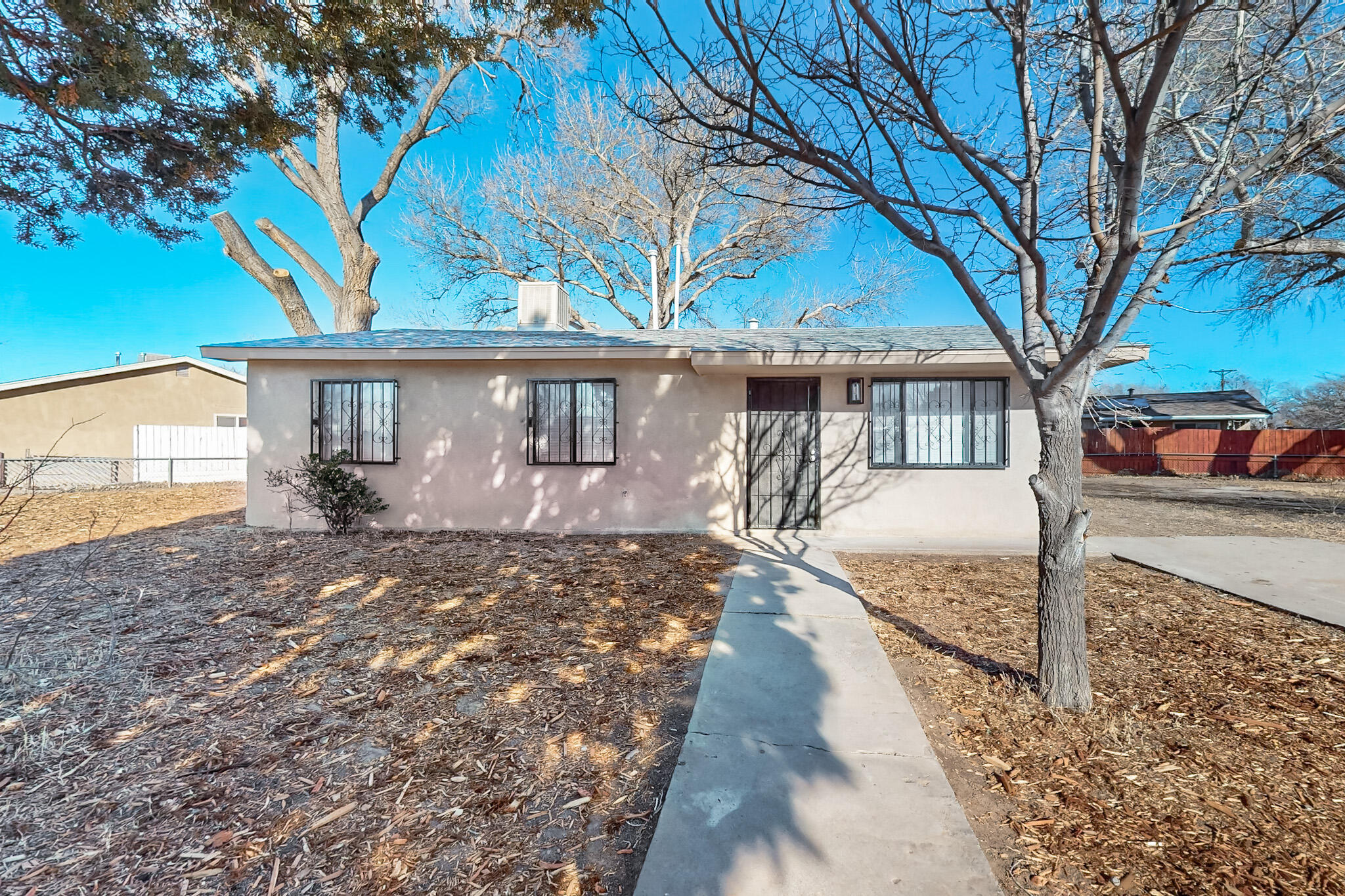 Great Location solid valley neighborhood, Hard to find 4-bedroom, 2 bath home.  Total remodel home, with new heater, new water heater, new flooring, new kitchen with stone countertops, new appliance package, upgraded bathrooms, and exterior stucco.  This home sits on .32 acres of land. Two amazing old growth cottonwoods, with backyard access.