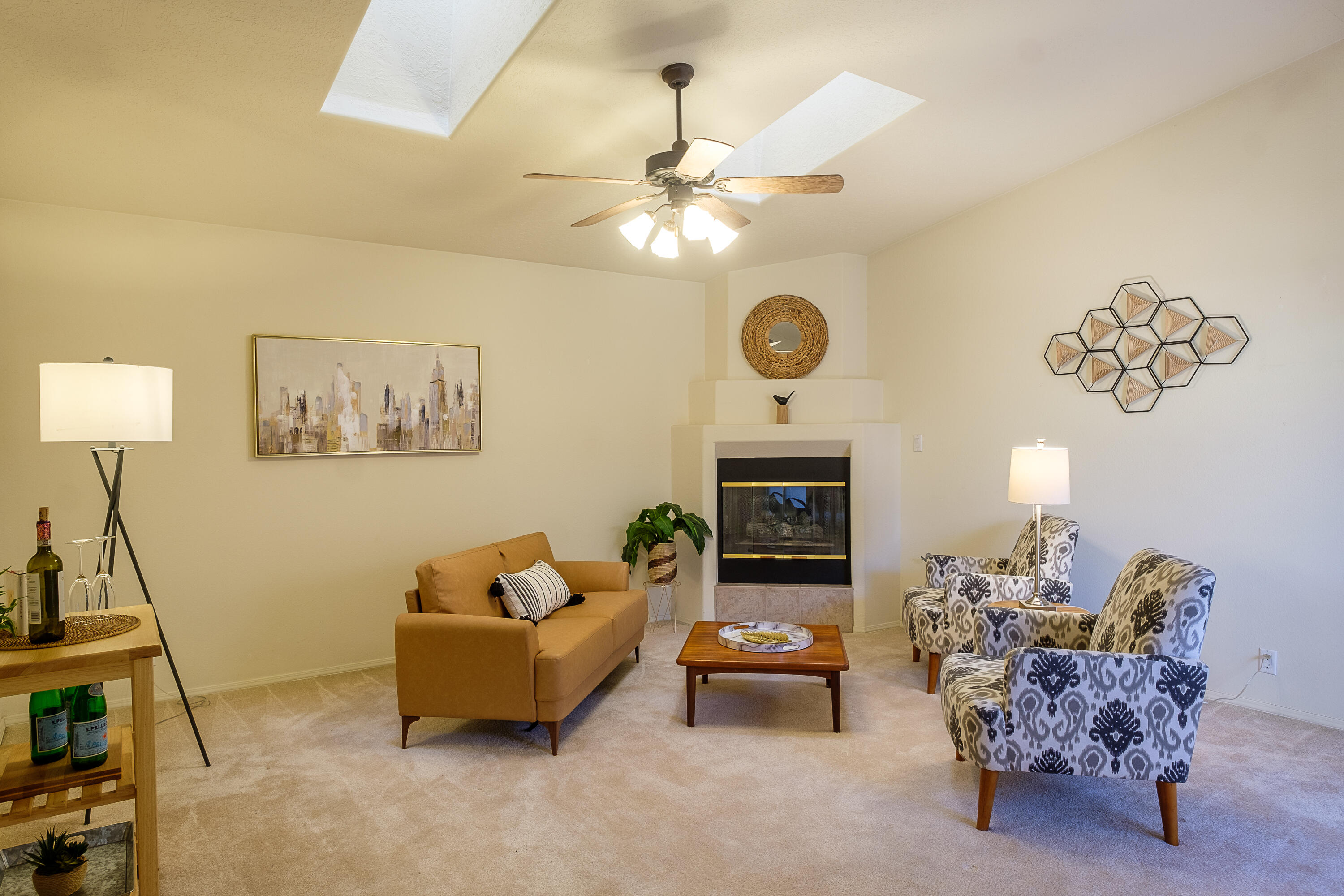 What a gem! Conveniently located NE Heights  single story town home near restaurants and shopping.  Cozy Courtyard entry leads to open Great room with fireplace , kitchen and dining area.   Primary bedroom features large walk-in closet.   Sweet rear yard . Brand new furnace.   Attached 2 car garage.
