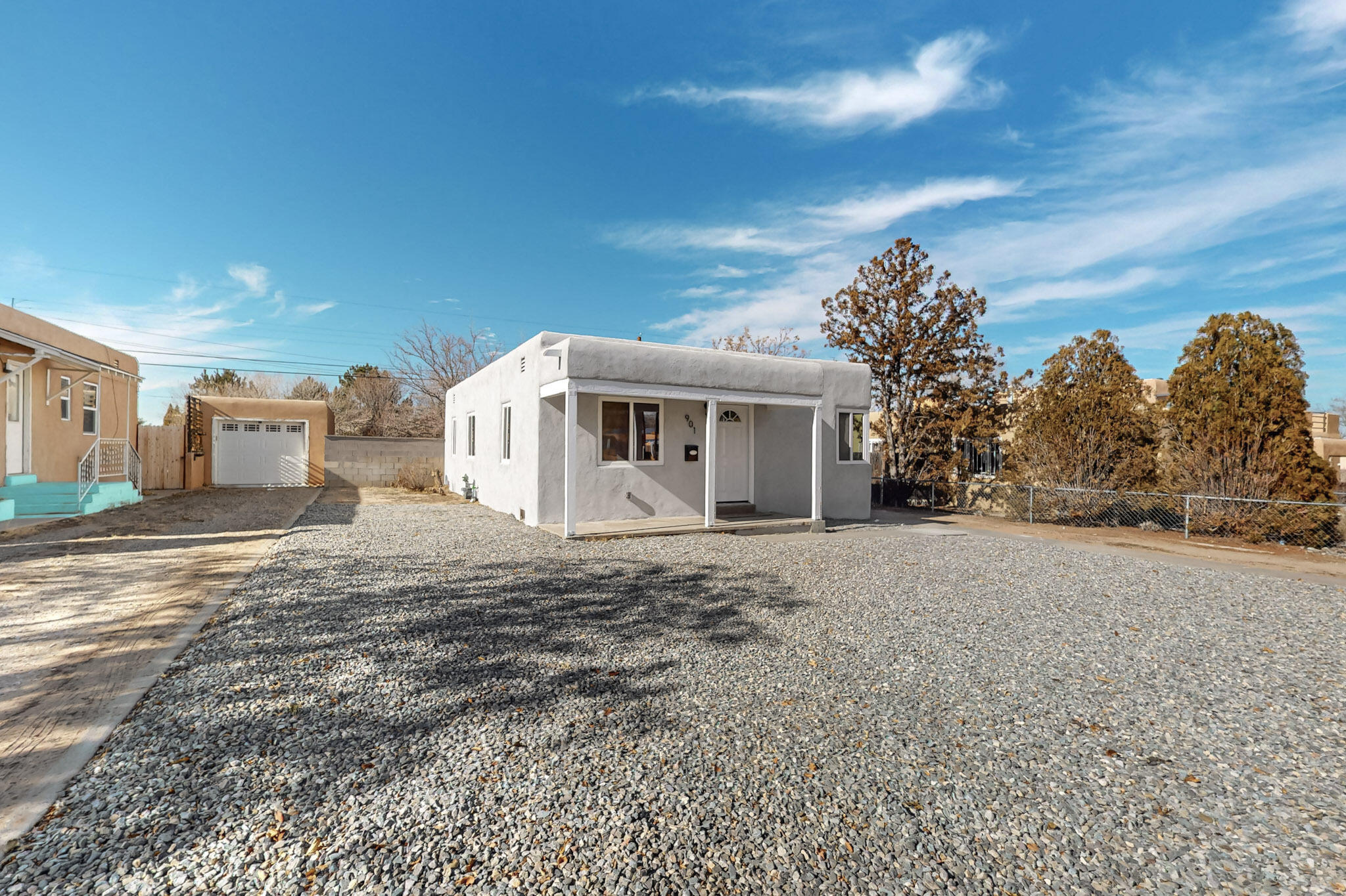 Welcome to this single story, 3 bedroom, 2 bathroom home located in UNM South. Features updated flooring and windows, refrigerated air, roof, and kitchen w/ stainless steel appliances. Primary bedroom includes full bath en-suite. Backyard features deck and easy access to detached garage.  Great location- close to major highways, shopping, schools, and local parks, providing easy access to everything Albuquerque has to offer.