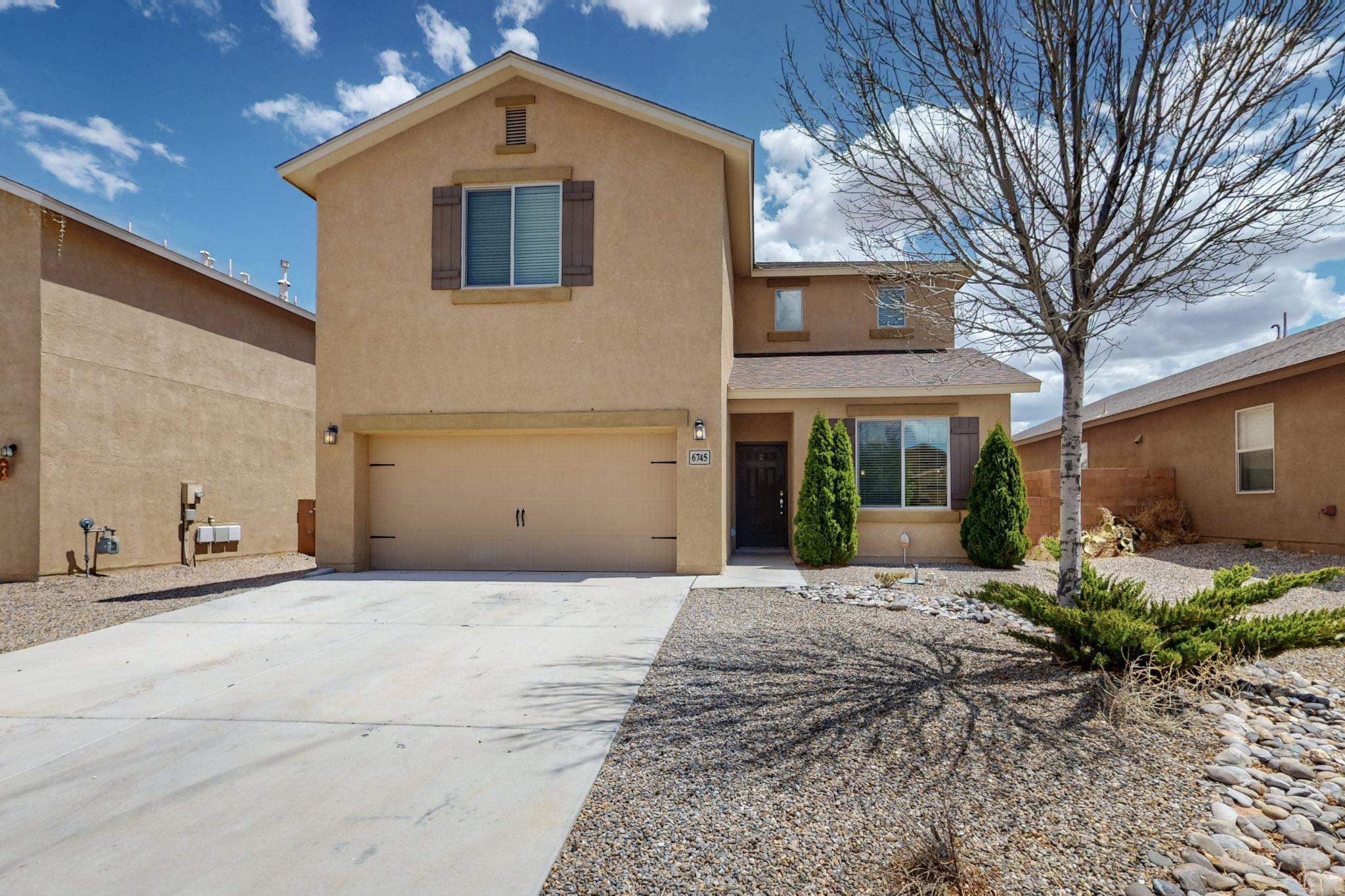 A spacious 5-bedroom, 2.5-bathroom  home offering comfortable living space providing ample room for both relaxation and entertainment. This residence combines modern amenities with a prime location in Rio Rancho, NM. The kitchen is designed for both functionality and style. This home boasts five well-appointed bedrooms, offering plenty of space for all. Master bedroom in on the main floor. For those who appreciate outdoor activities this location offers access to a variety of options. Situated with easy access to major highways, commuting to surrounding areas is straightforward, making this location ideal for those seeking both convenience and a peaceful neighborhood setting. Washer and dryer convey with the home. NO PID, NO HOA.