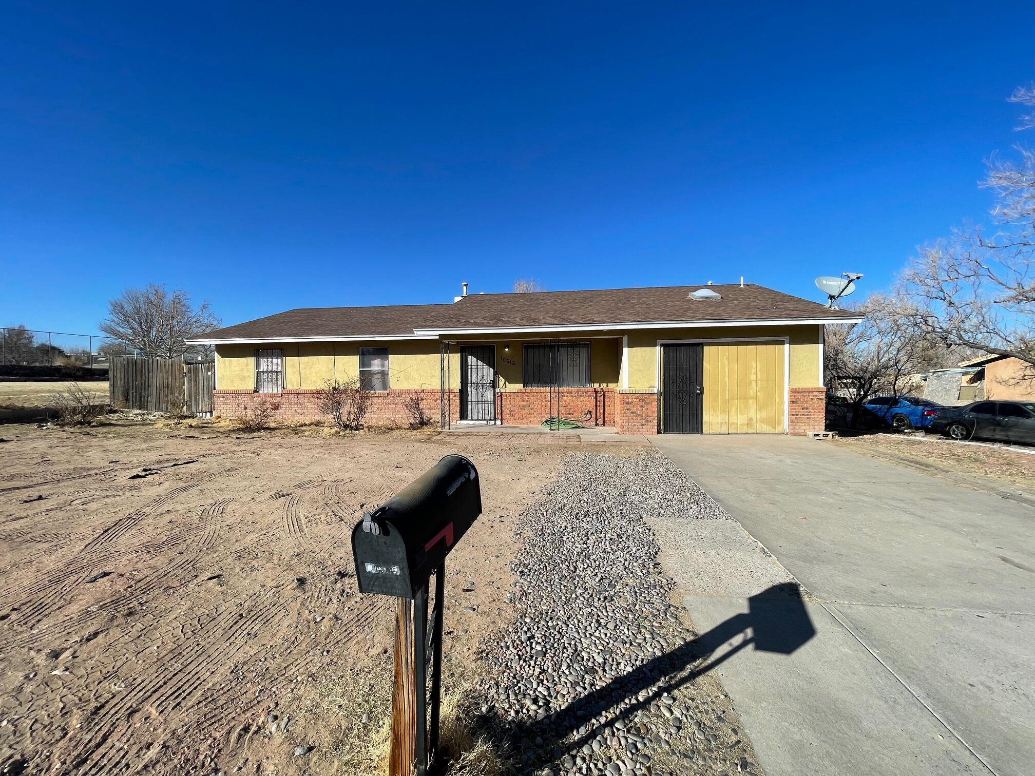 Great Location on a lot that is adjacent to a city park, which includes a tennis court, basketball court and playground. *** This home has so much potential with some updates. ***