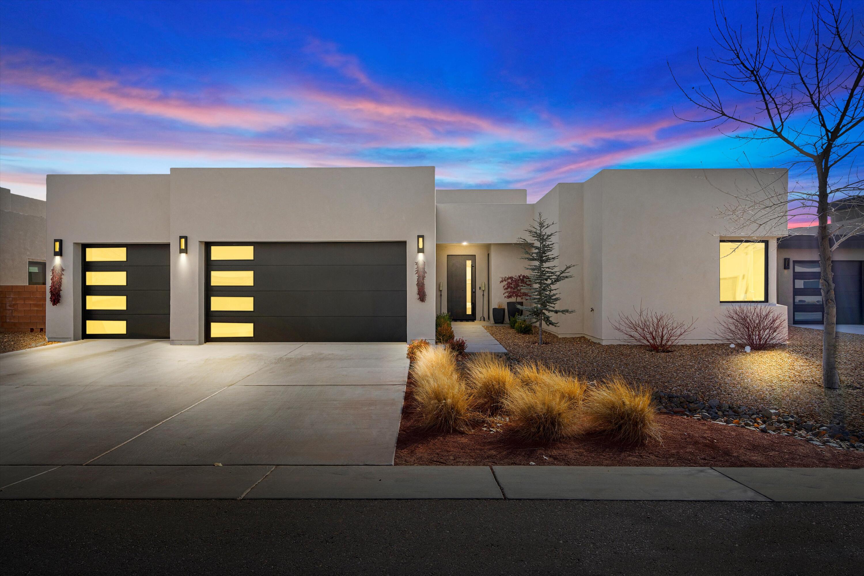 DISCOVER A HIDDEN SANCTUARY IN ALBUQUERQUE'S NORTH VALLEY! Nestled within Bosque Antigua's luxury gated community, this home offers tranquility and modern elegance. Imagine morning coffee under shady cottonwoods, sunlight streaming through a skylight in your gourmet kitchen, complete with built-in appliances and a spacious island. Upscale laminate floors guide you to a custom fireplace, the heart of the open living space. The serene master suite boasts a spa-like bath and walk-in closet. Outside, a large, fenced backyard with a covered patio invites endless evenings of relaxation. With direct access to Paseo del Norte trails and just minutes from Downtown and Old Town, this home offers the perfect blend of nature and convenience. Don't miss your chance to make this dream yours--call now!