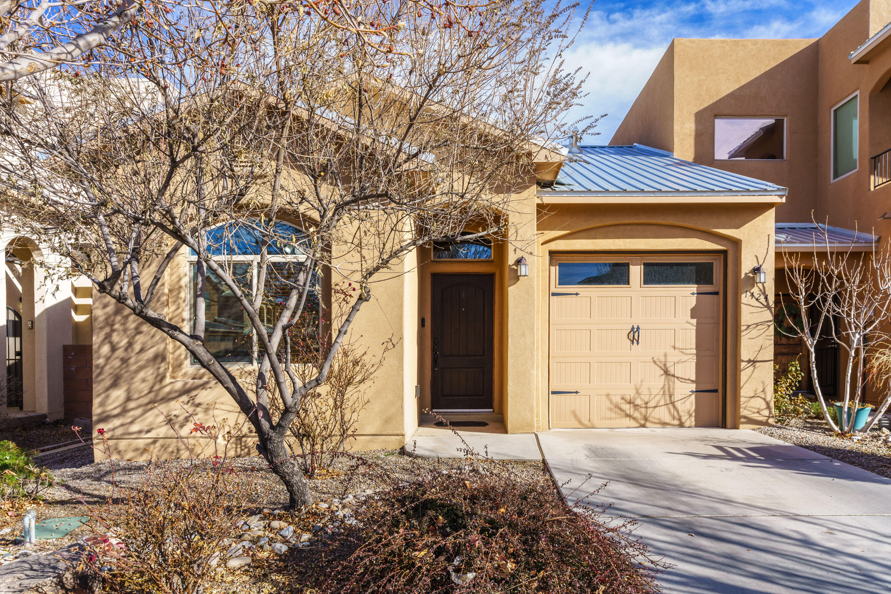 **INVESTMENT OPPORTUNITY** **Tenant Occupied** 24 hour notice required to show. Current rental agreement is thru May 2026 at $1,800/mo. LEASE WILL CONVEY w/PURCHASE. Welcome to Sawmill Crossing! Custom Construction, SINGLE LEVEL Green Build-NM Silver Level. Arched Doorways, Open Floor Plan and thoughtful use of space. Abundant natural light, tankless water heater, 2x6 Construction, Blown-in Insulation, Low E windows. HUGE Master Suite. Conveniently located near Old Town/Museum District Area, less than 10 minutes to UNM, and hospitals. Two minutes from I40 and 12th. Less than 5 minutes to Museums, Microbrews and Community Parks! Two blocks from NM's ONLY 5 star hotel - Hotel Chaco with rooftop bar and Sawmill Market.