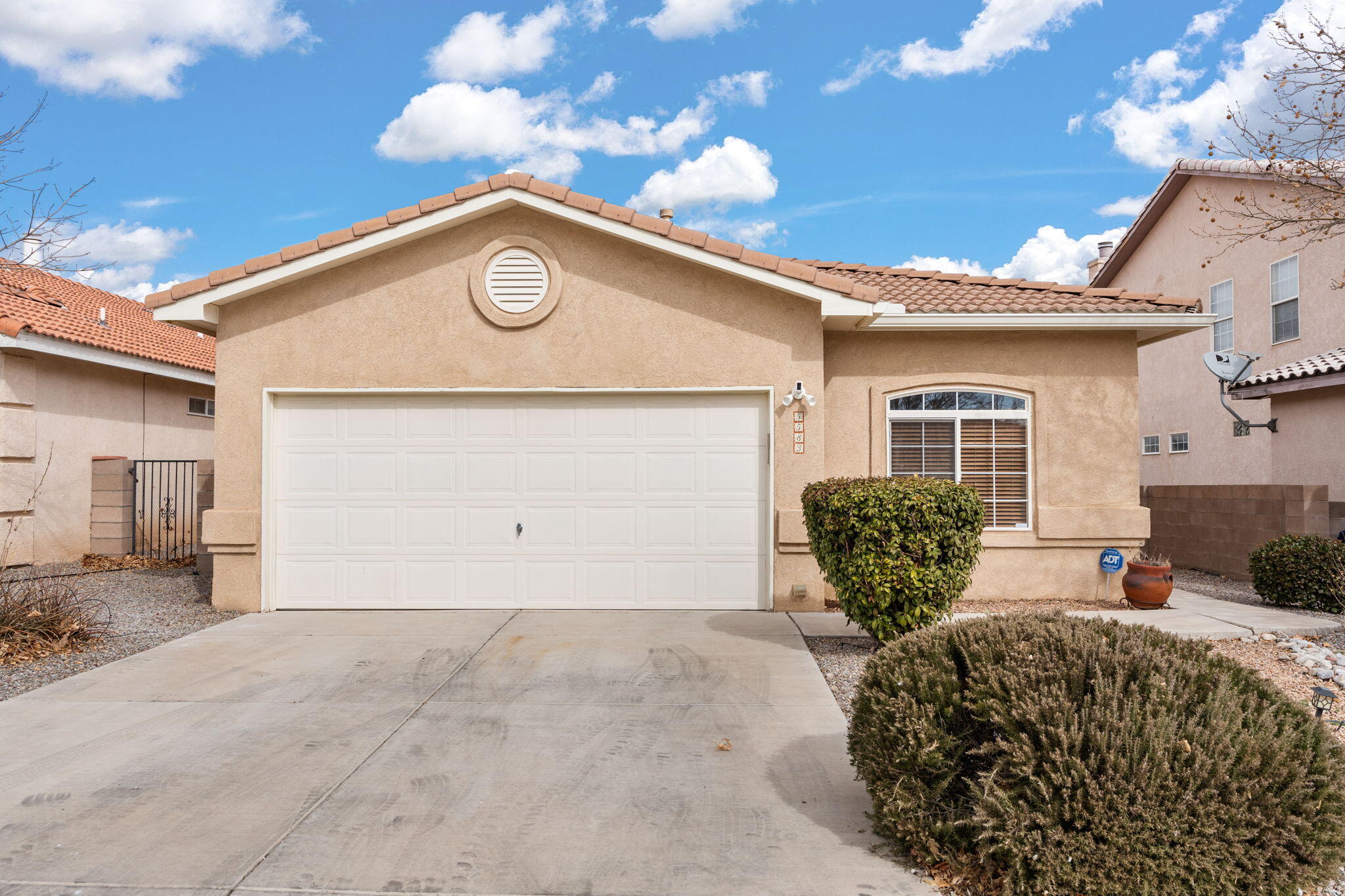 Is an awesome location on your list of must haves? You'll love this cute neighborhood on Paradise Boulevard! Awesome floor plan with vaulted ceilings and brand new beautiful flooring. A cozy fireplace highlights the living room. Large kitchen with tons of counter-space, an island and lots of cabinets for storage!  Super cool flex room for an office or game room.  Primary bedroom also has vaulted ceilings and an ensuite bathroom with soaker tub and walk in shower.  The laundry room feels special with a cute little window. Refrigerated air & tile roof!