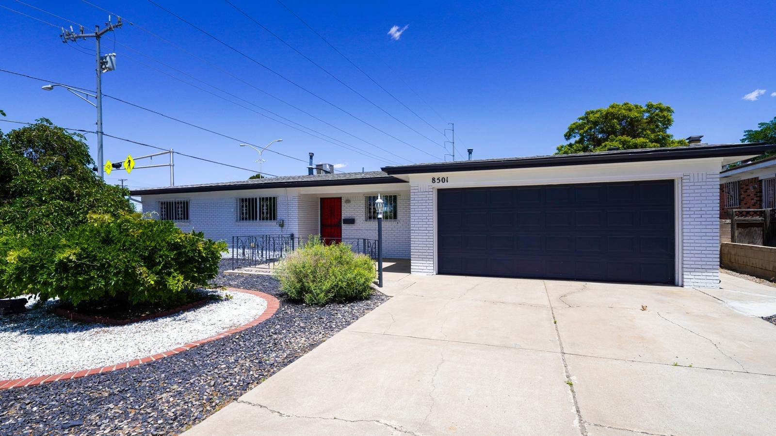 Welcome to your dream home! This beautifully updated single-story residence offers 3 spacious bedrooms and 2 modern bathrooms. Step into the heart of the home where you'll find a sleek, newly renovated kitchen complete with stylish cabinetry, updated countertops, and contemporary tile flooring. The open layout features not one, but TWO cozy living areas--perfect for entertaining or relaxing with family. A charming wood-burning fireplace adds warmth and character to the space. Outside, enjoy an expansive screened-in patio, ideal for enjoying the outdoors year-round. Located in the desirable NE Heights, you'll be just minutes from restaurants, schools, parks, and convenient access to I-40. With abundant shopping options nearby, this home truly has it all! Don't miss out--schedule your showing