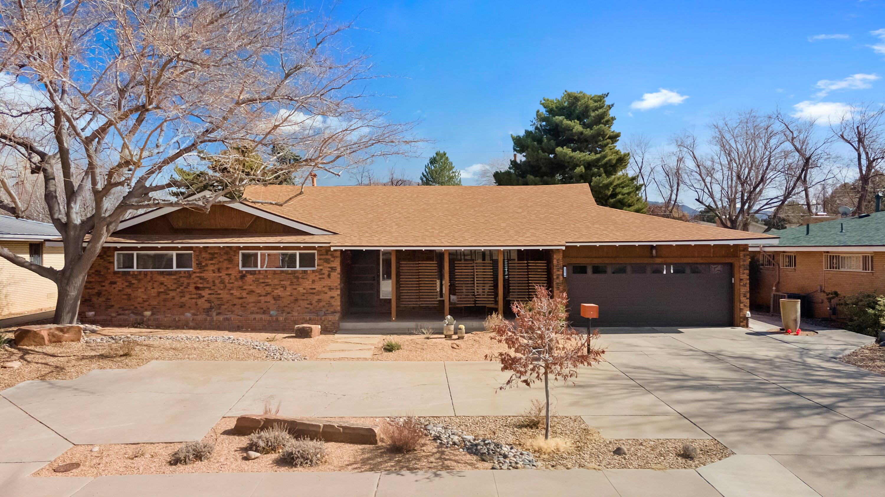 Location, Location, Location. This established uptown neighborhood consists of custom mid-century homes, close to everything. This home received a complete professional remodel in 2019, which transformed it into a modern masterpiece all while leaving touches of the mid-century designs.  Additional upgrades and improvements have been made over the last 5 years, making this home truly amazing.  The open floorplan, breakfast bar, custom backsplash, stainless appliances, quartz counter tops, hardwood floors, and stone fireplace are only a few of the high-end touches incorporated into this home.  With every room in this home being large, the three bedrooms and 3 bathrooms and two living areas will provide a comfortable space for everyone in the family.